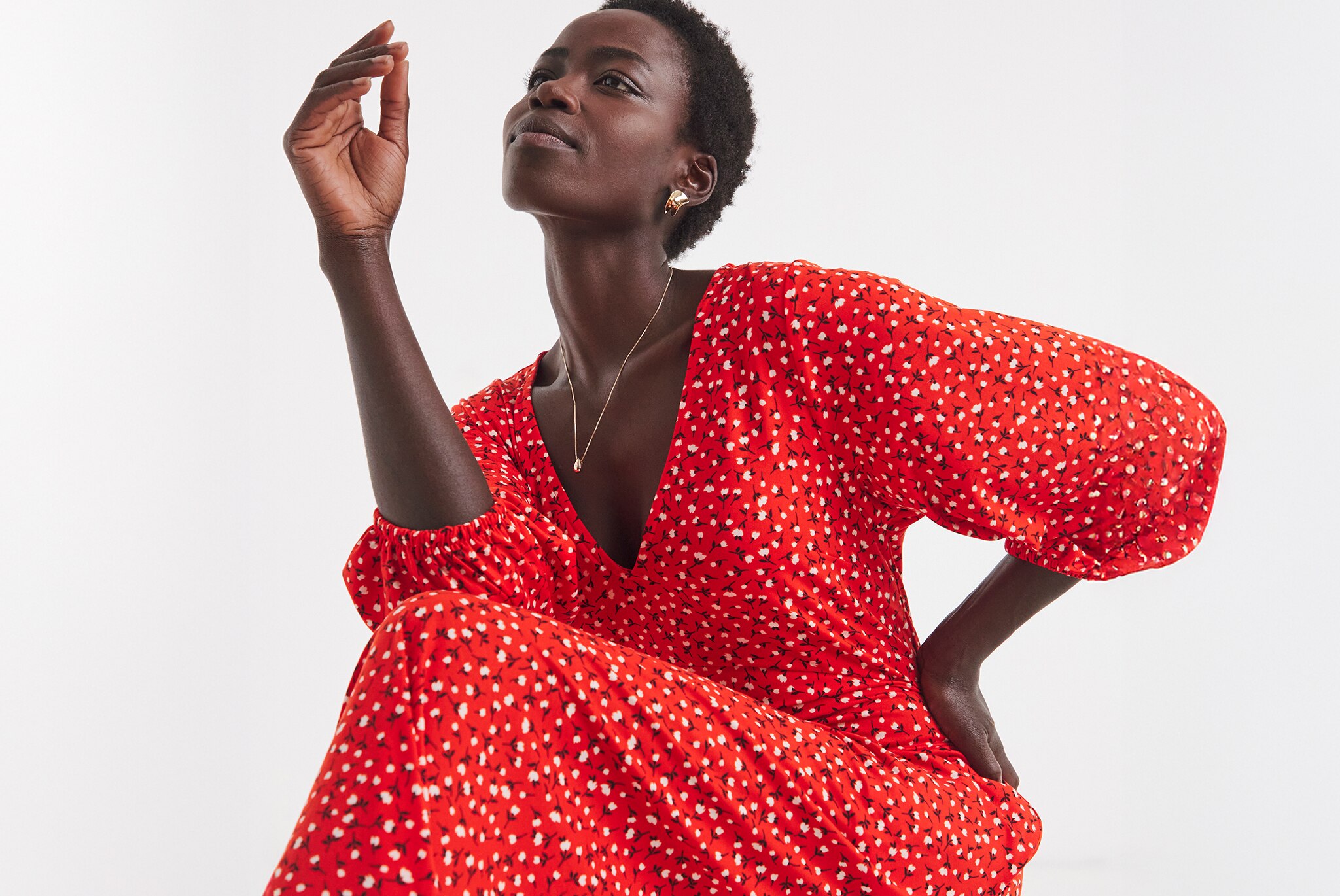 Model wears Puff Sleeve Soft Touch Jersey Dress in Ditsy Print