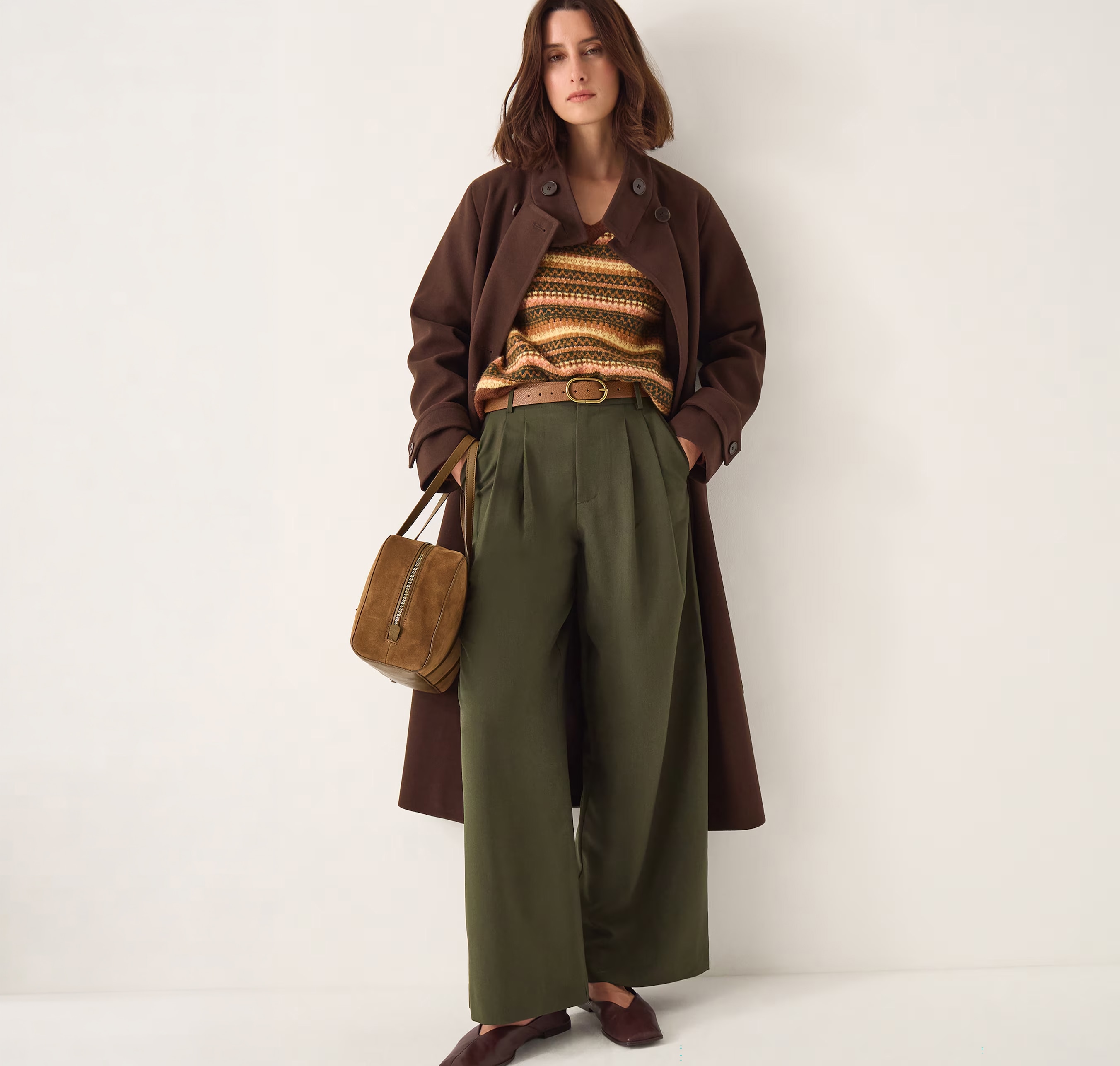 A lady wearing khaki trousers