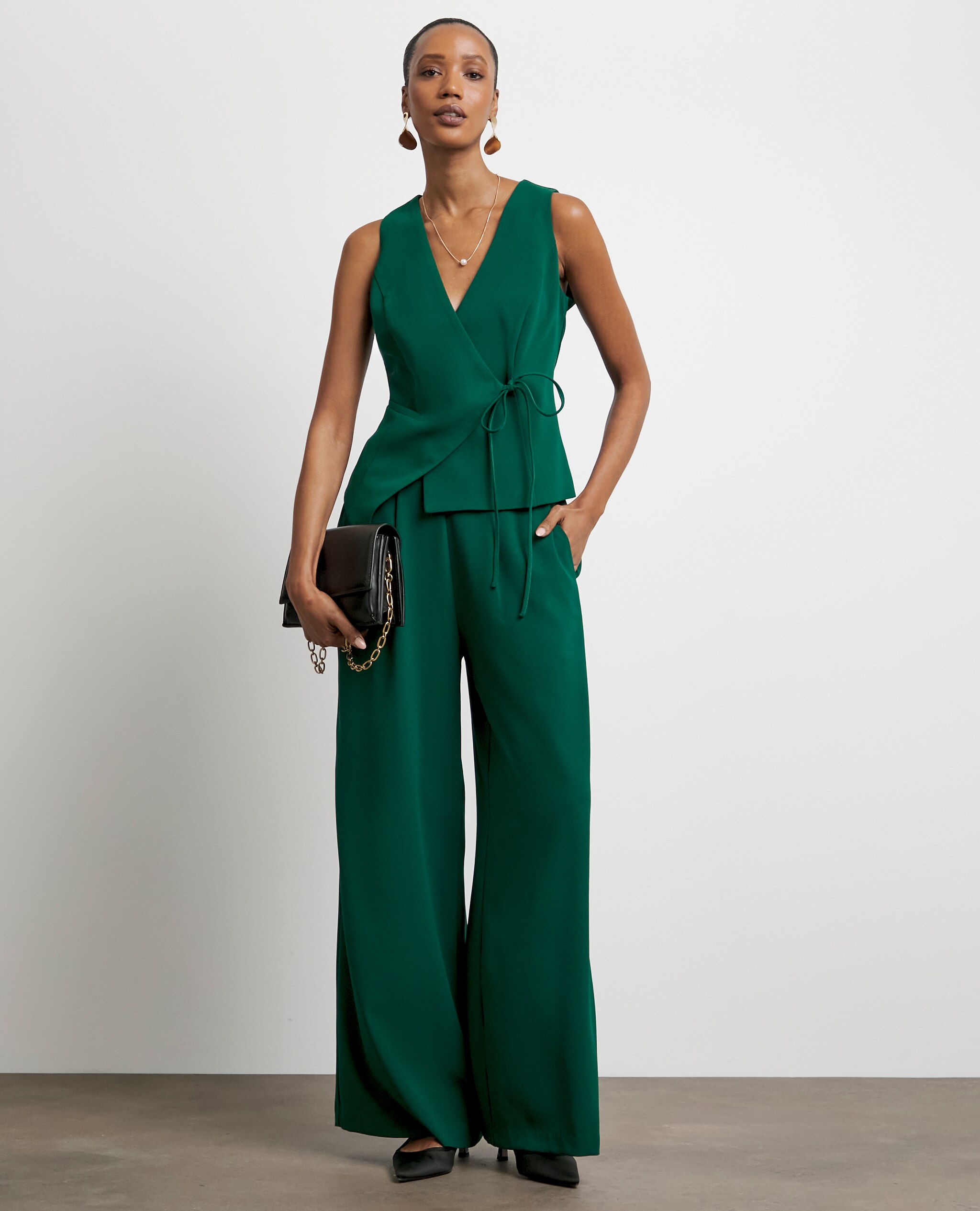Model wears Joanna Hope Wide Leg Trousers in Deep Green