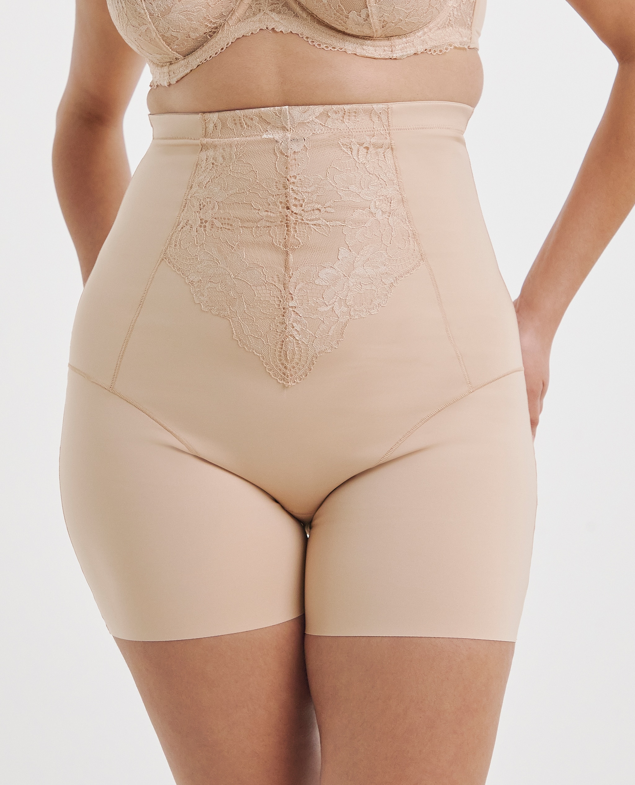 Model wears MAGISCULPT Firm Control New Ella Thigh Shaper Brief Blush