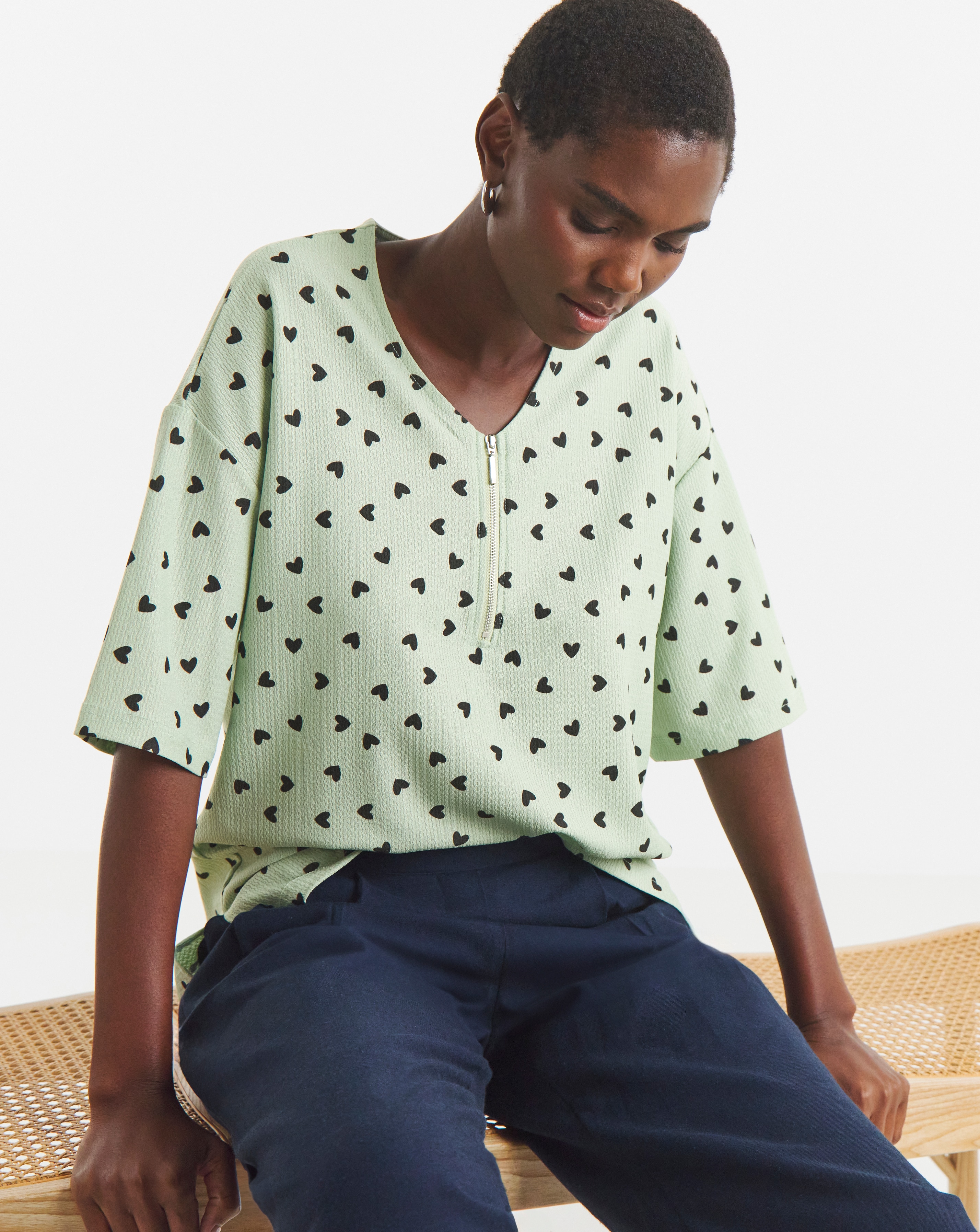 Sage Heart Print Textured V-Neck Zip Front Short Sleeve Longline