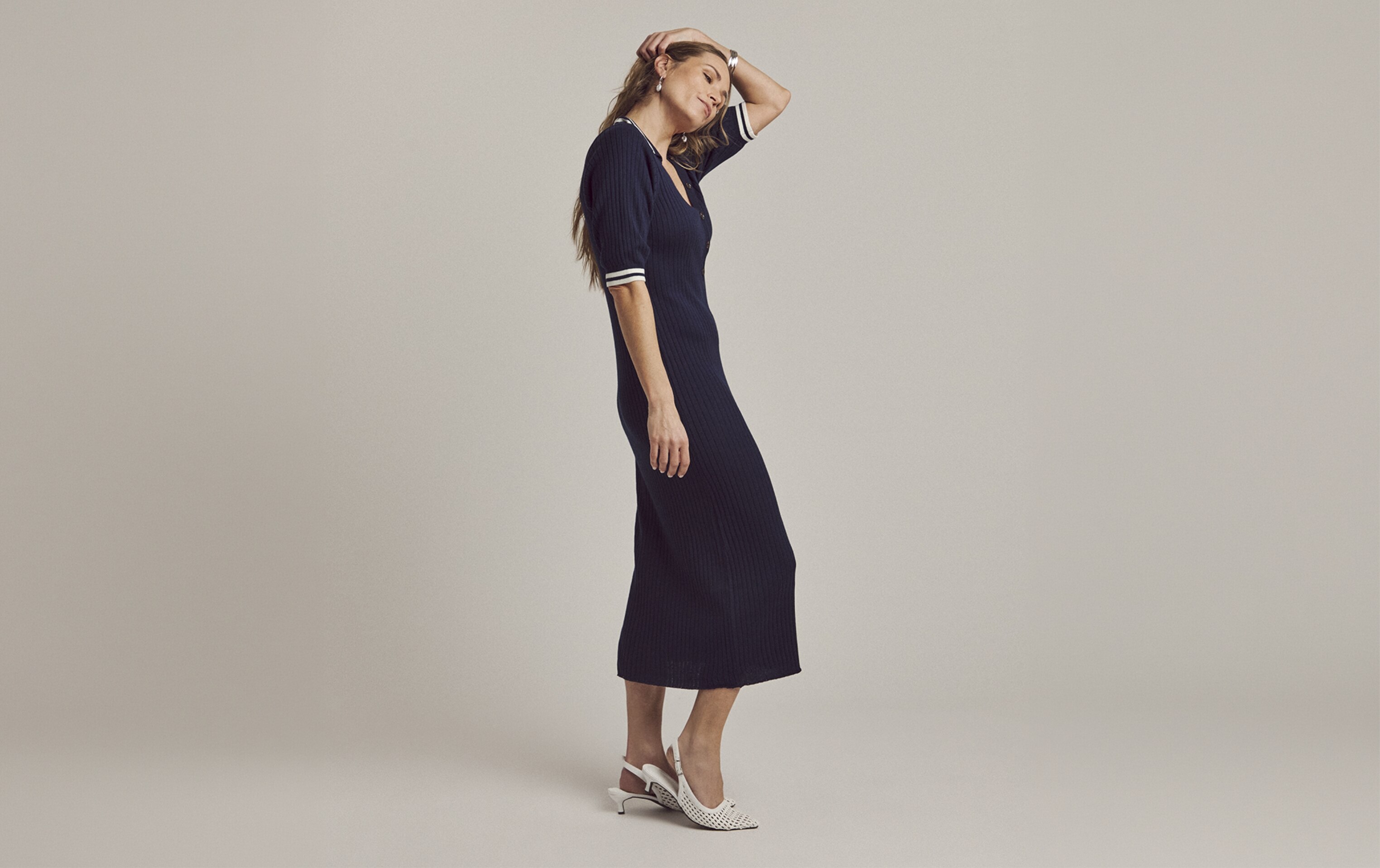 Woman wearing navy dress
