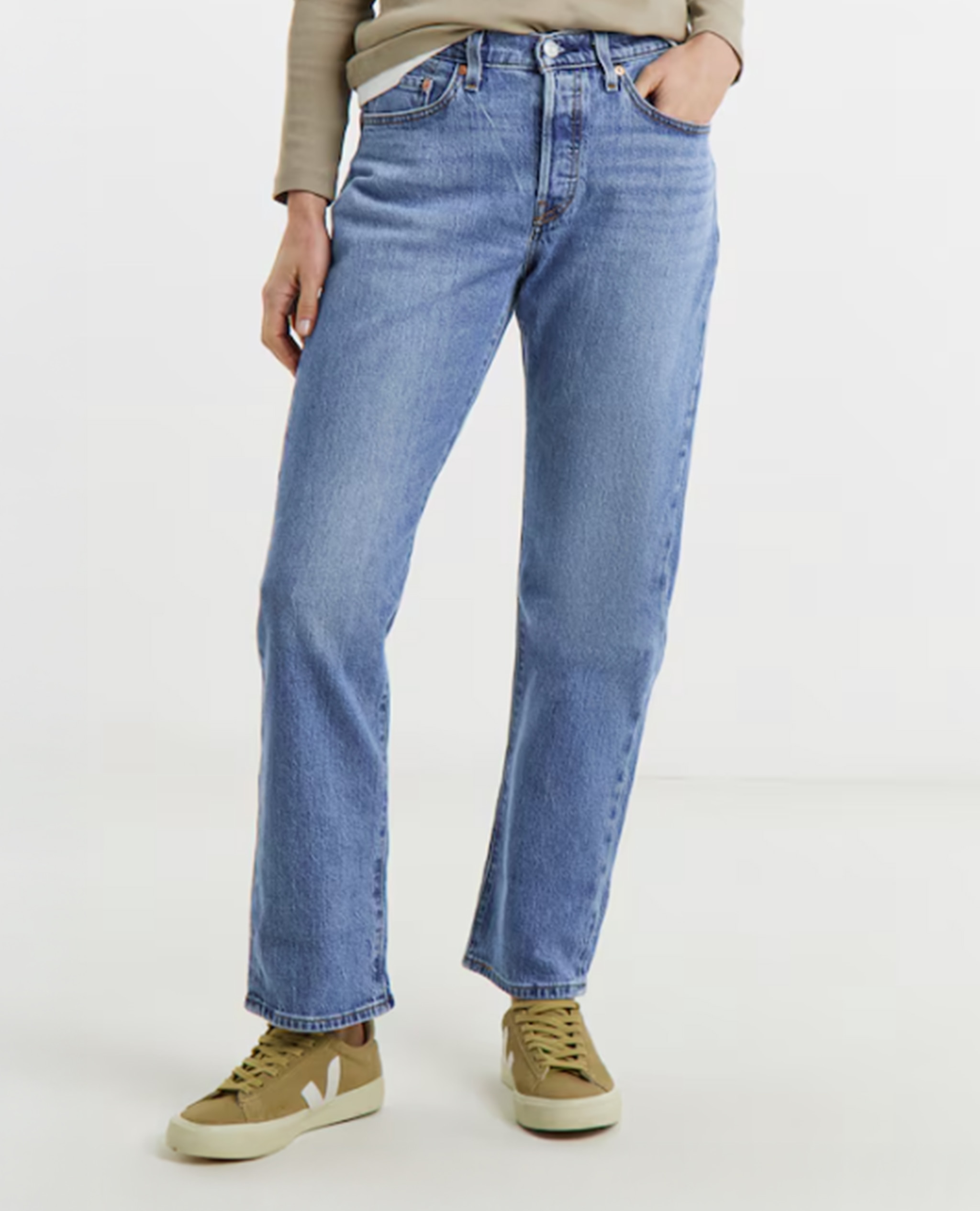 Model wears Levis 501 Curve Jean - 32 Leg in Light Wash