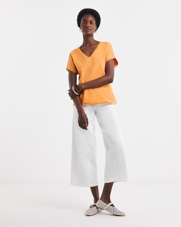 Orange Scallop V Neck Bubble Hem Top