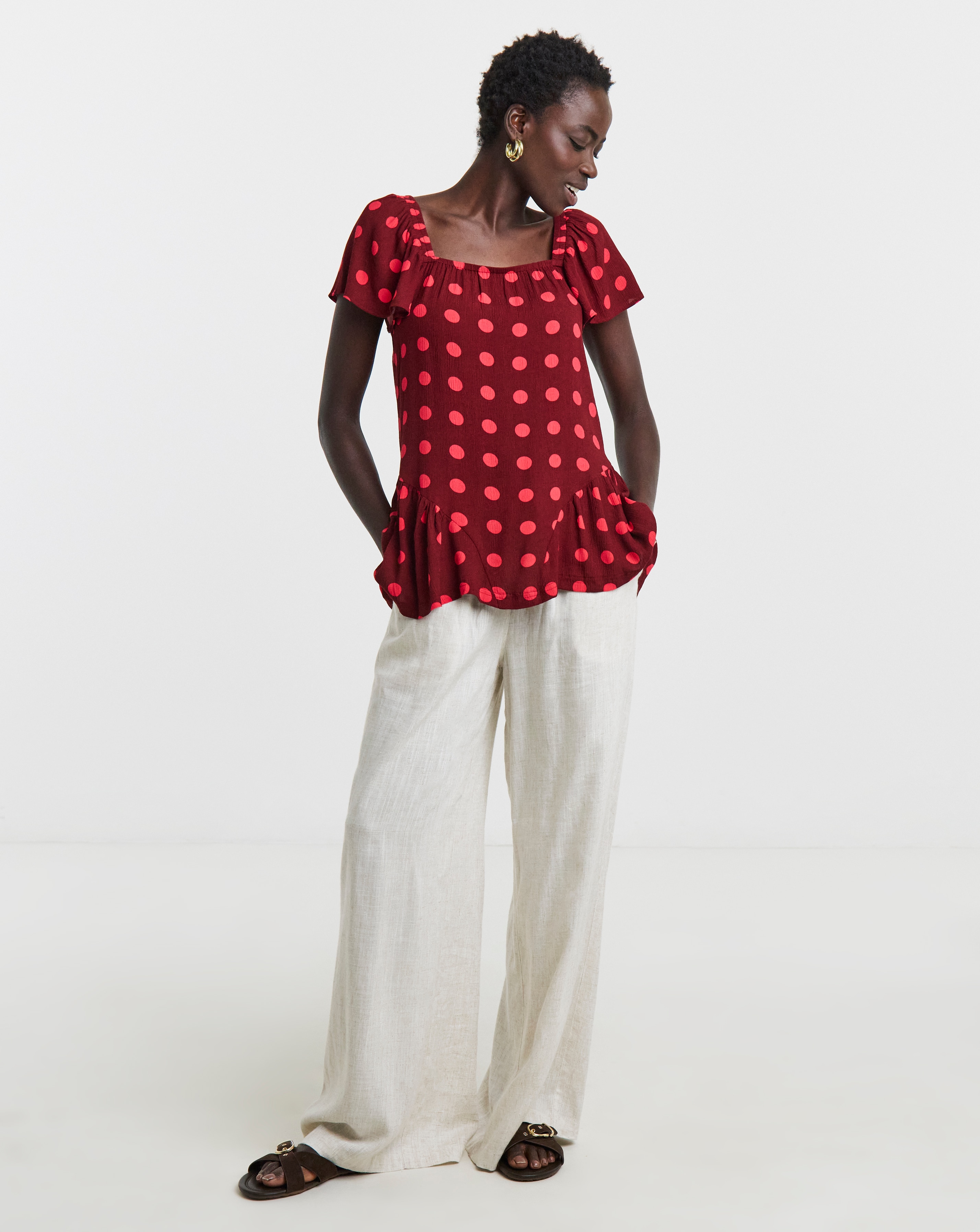 Spot Crinkle Peplum Top | JD Williams