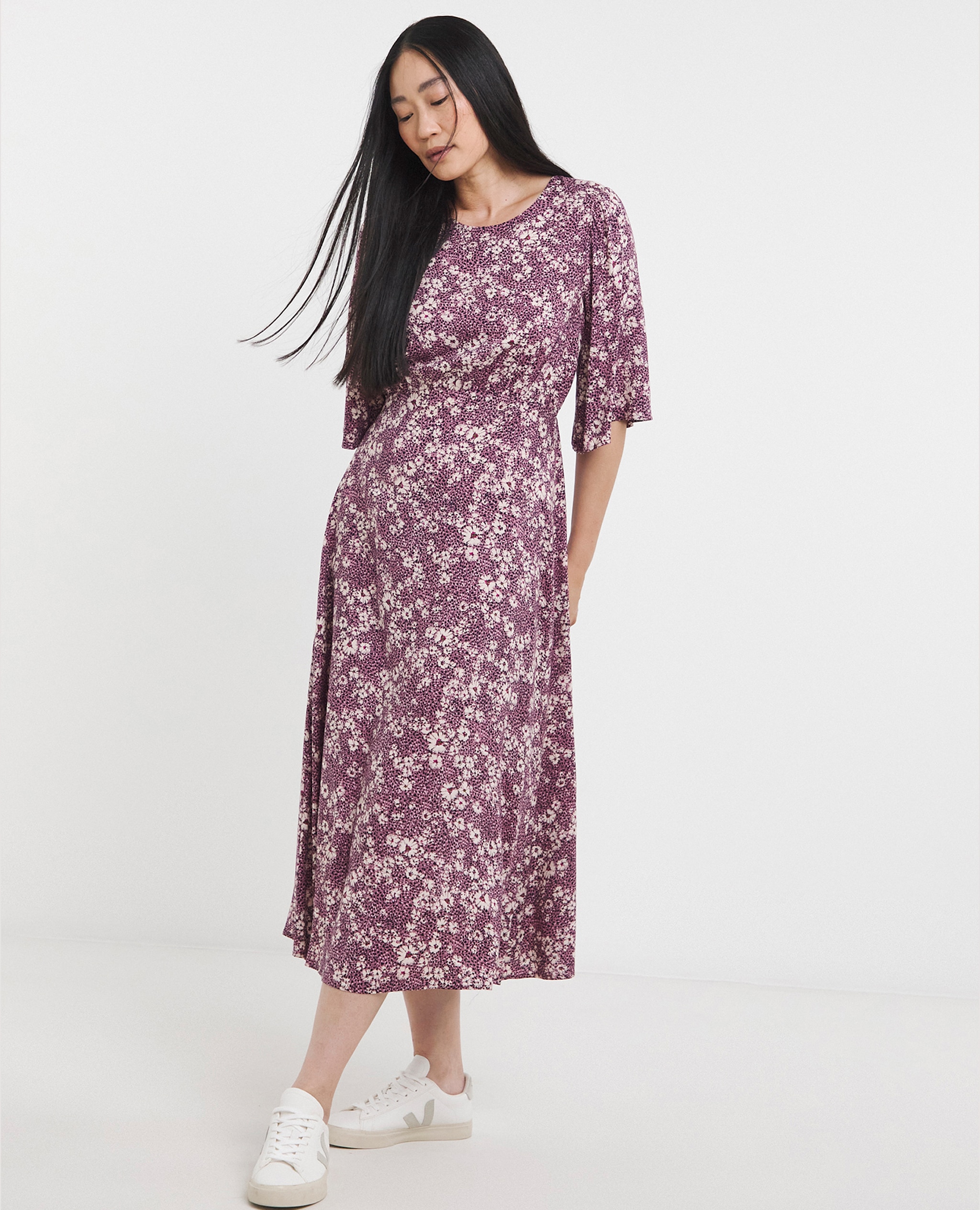 Model wears Half Sleeve Angel Sleeve Tea Dress in Pink Floral