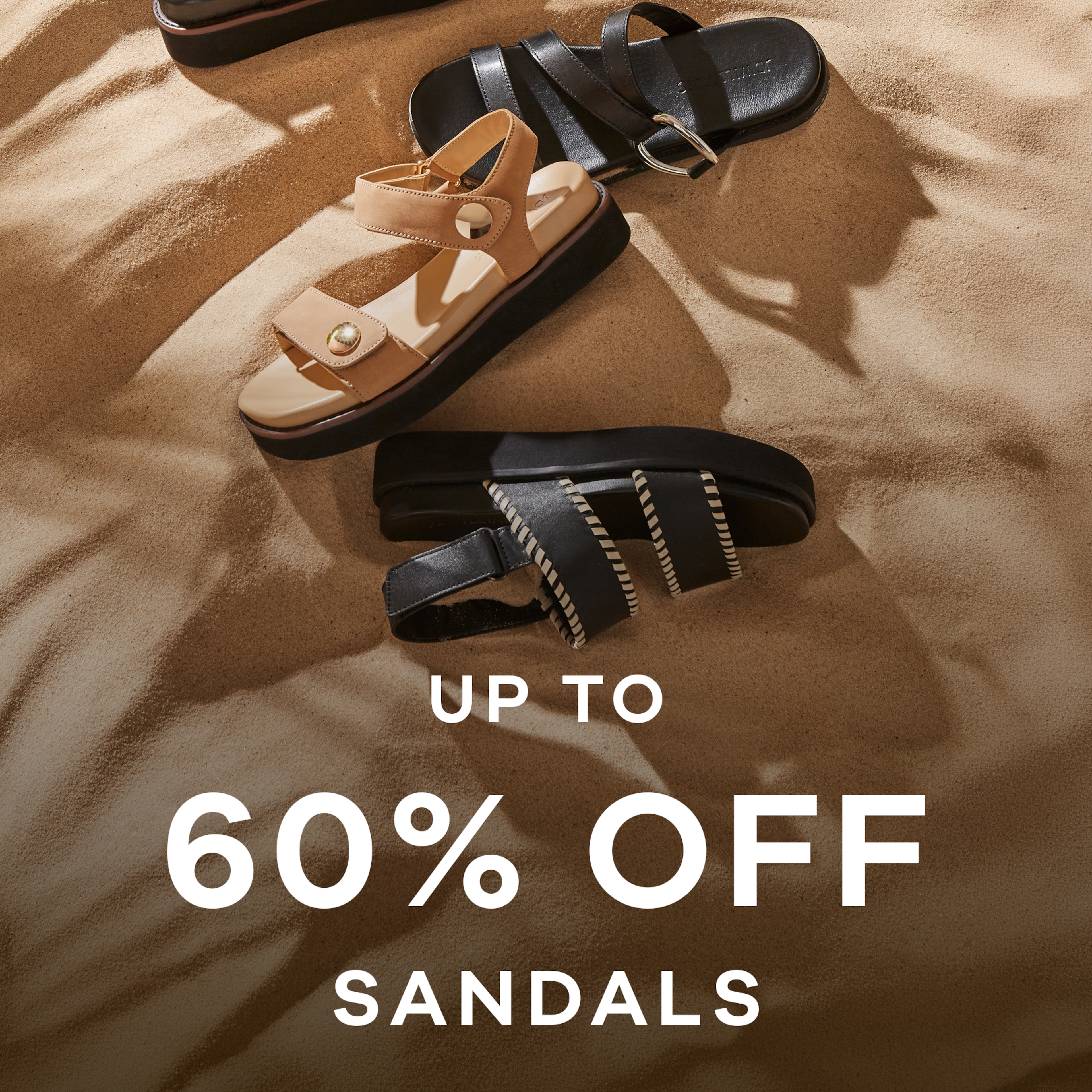 Different Sandals laid across sand. Up to 60% off sandal.