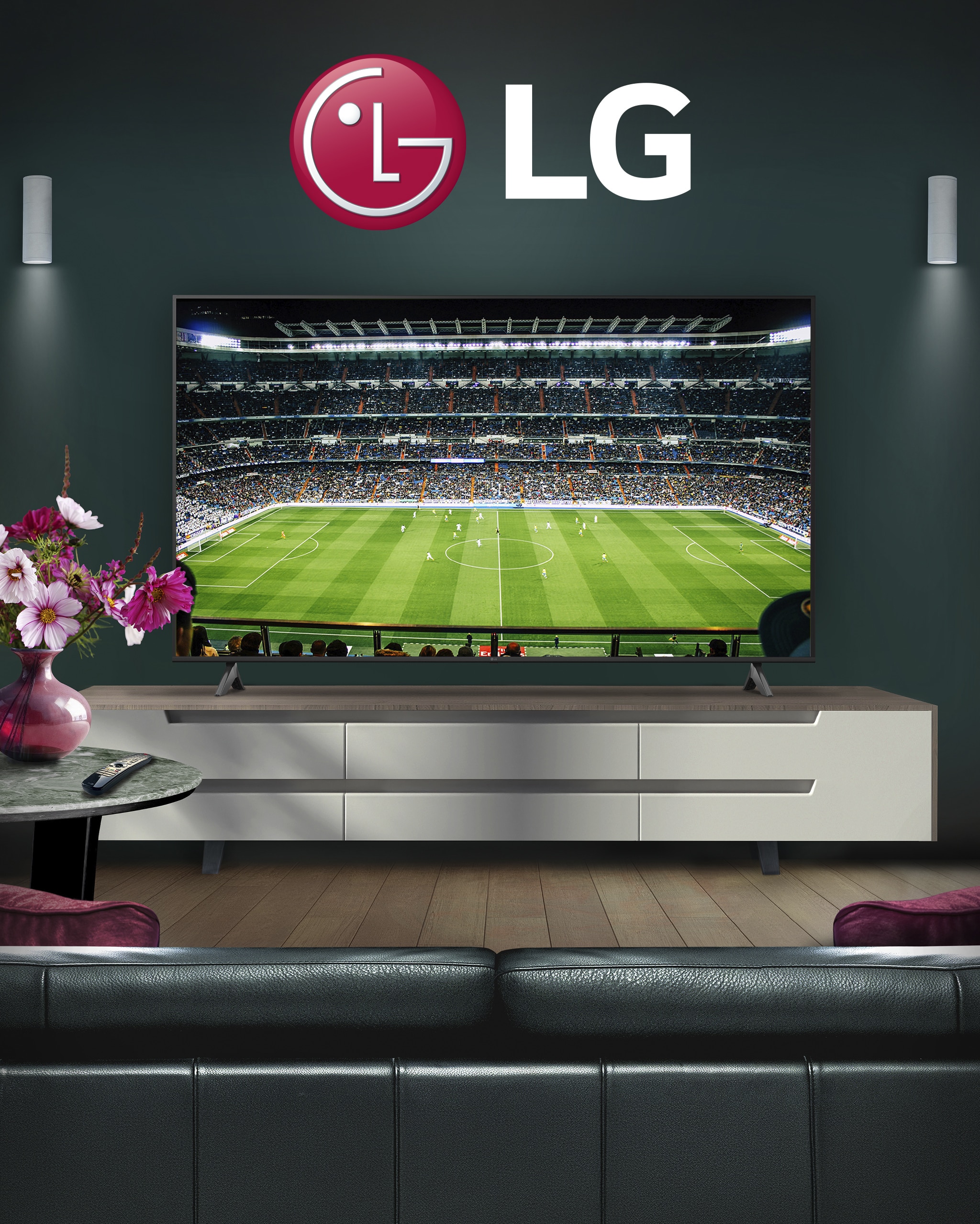 An LG tv in a living room displaying a football stadium.
