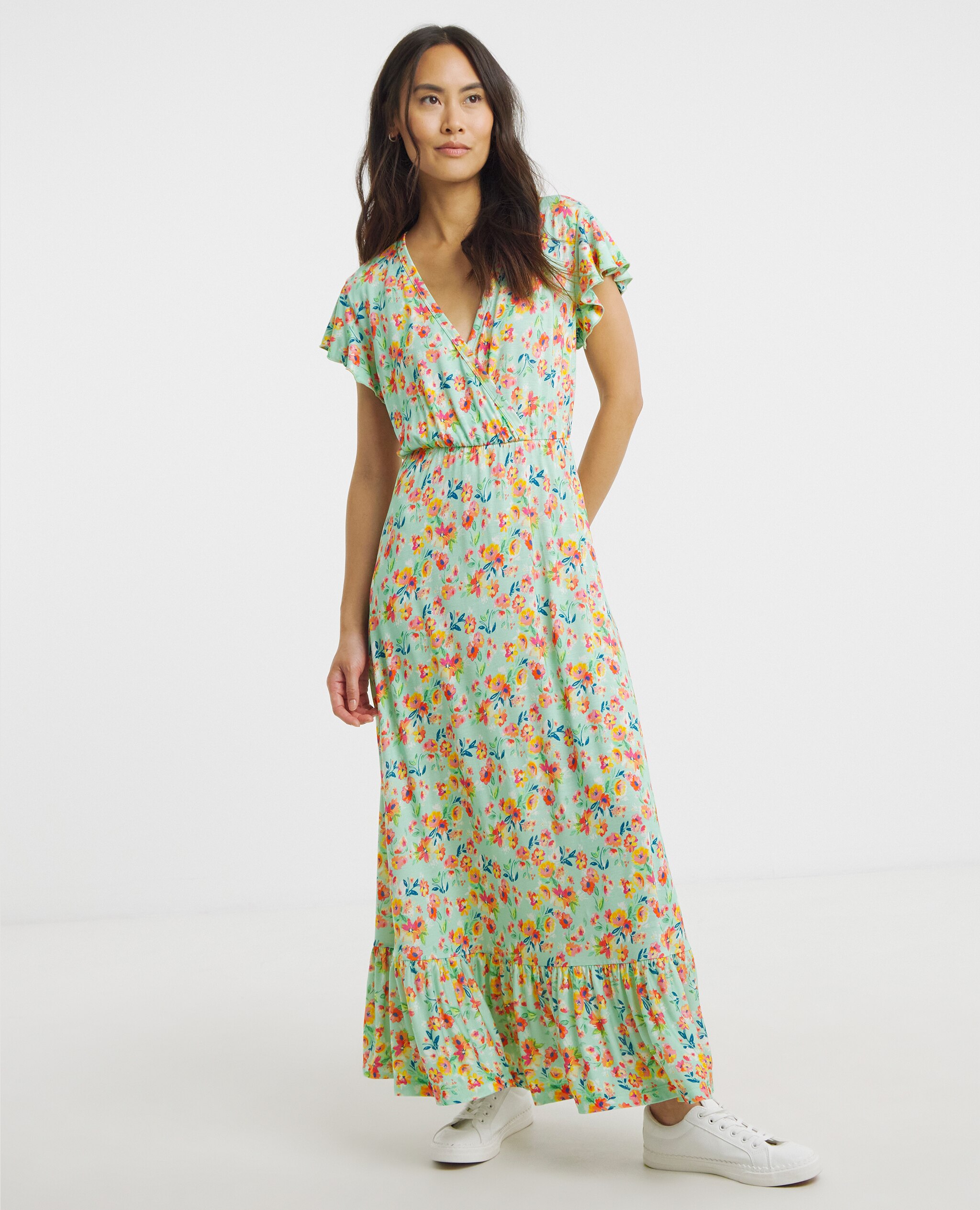 Model wears Joe Browns Emma Frill Floral Maxi Dress in Green Multicolour