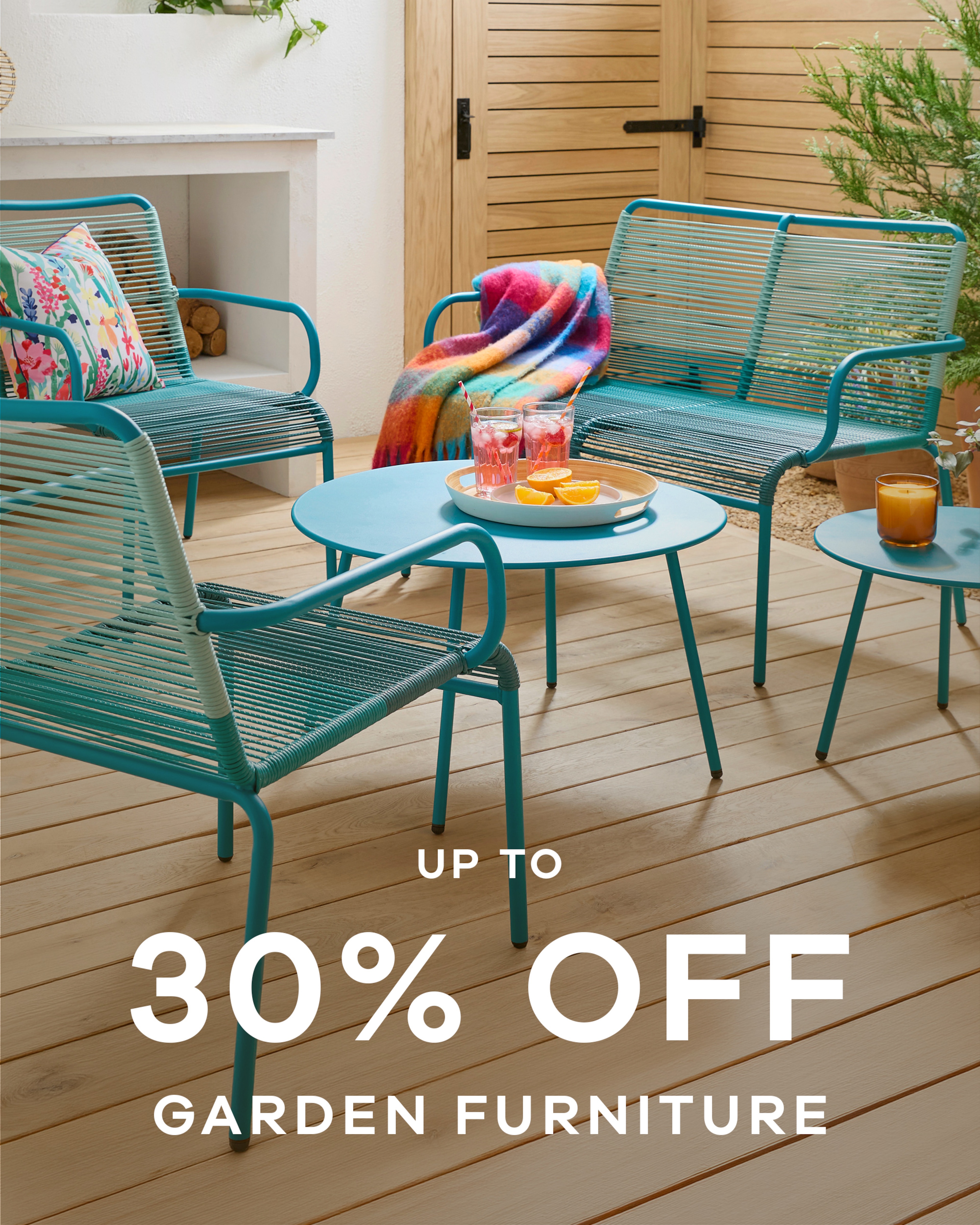 Up to 30% off garden furniture. A garden with torquoise garden furniture in it.