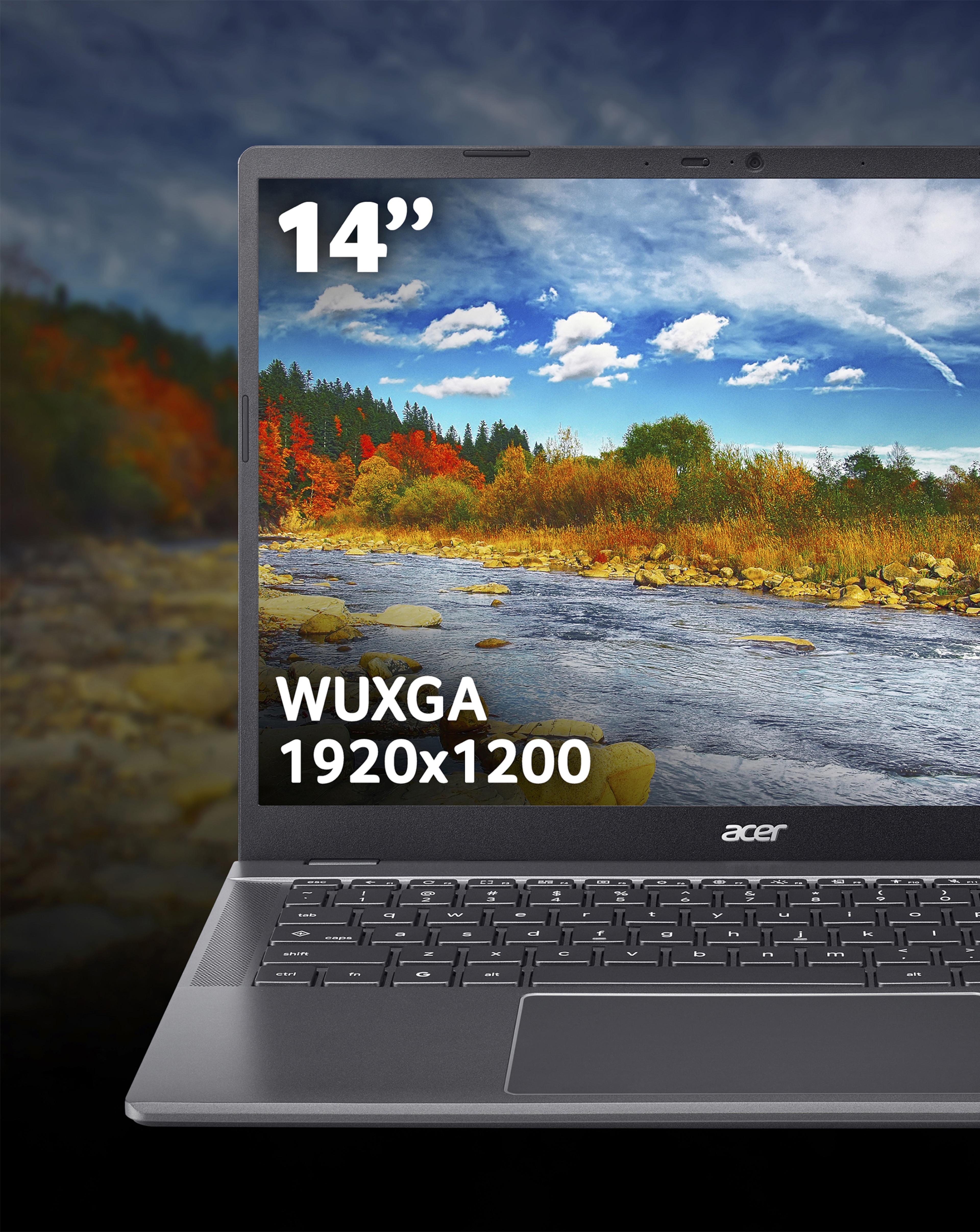 An Acer laptop displaying an image of a river and autumnal colours of trees on the screen