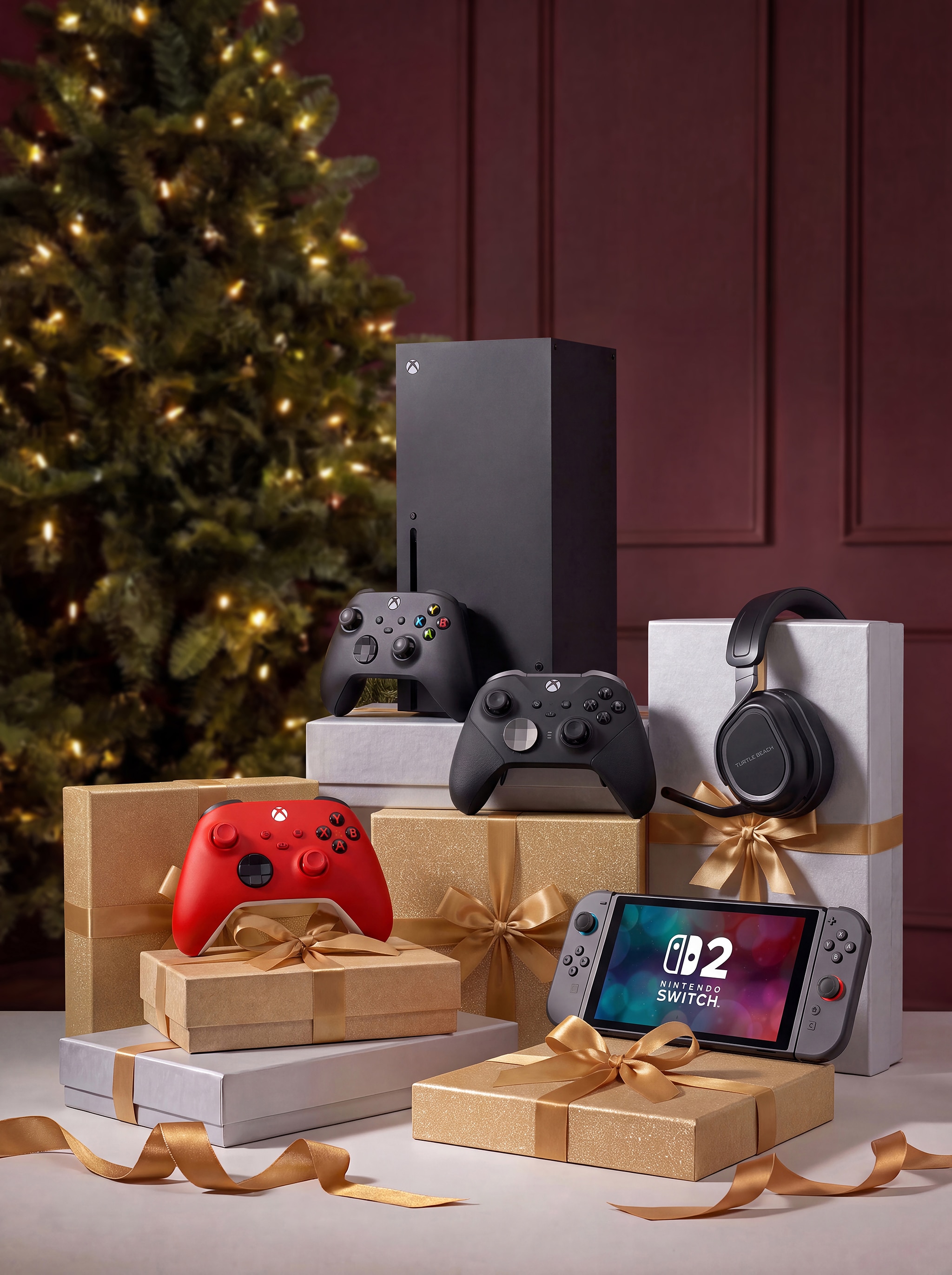 Computer consoles and controllers on a table.