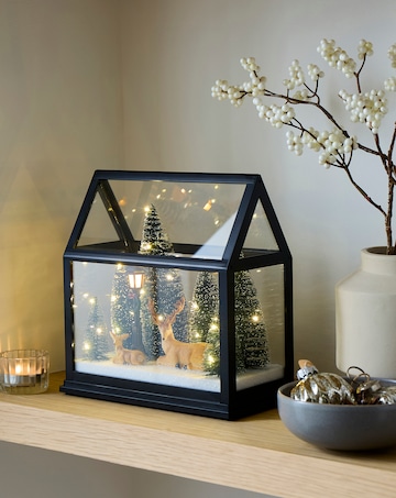 Lit Glass House with Reindeer Scene