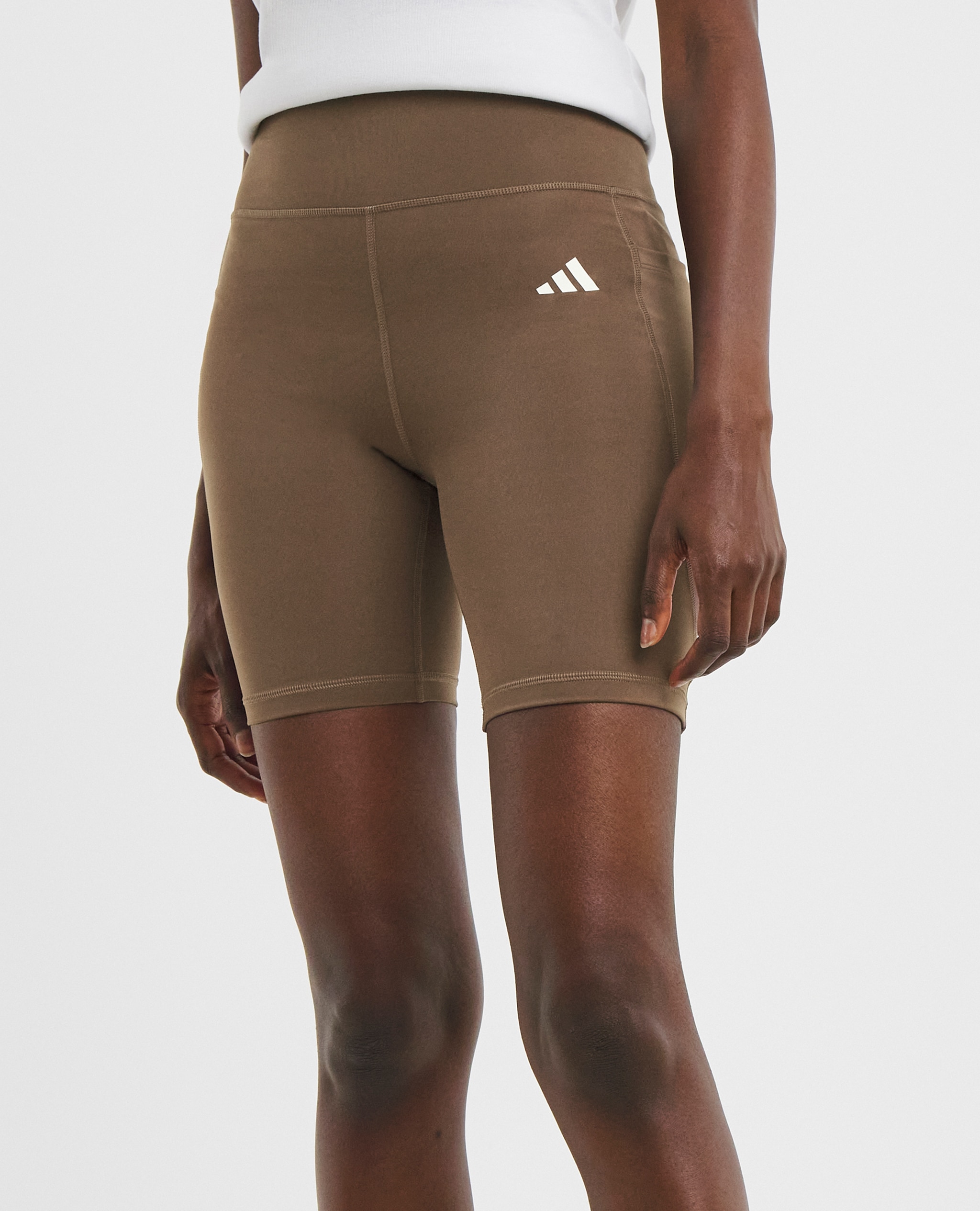 Modle wears adidas Essentials Cycling Shorts