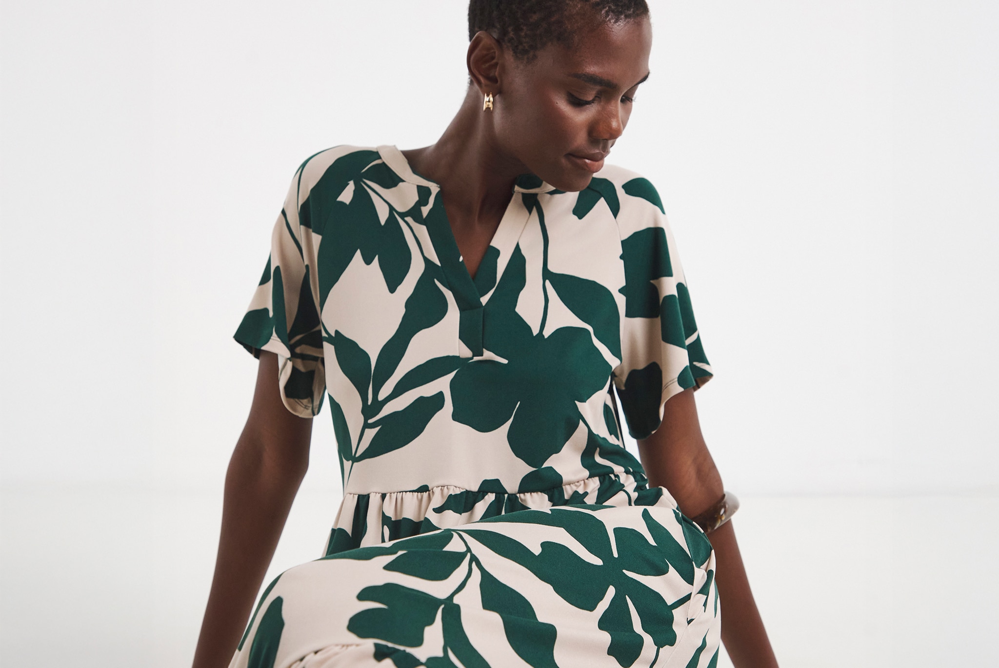 Model wears Jersey Notch Neck Maxi Dress in Abstract Print