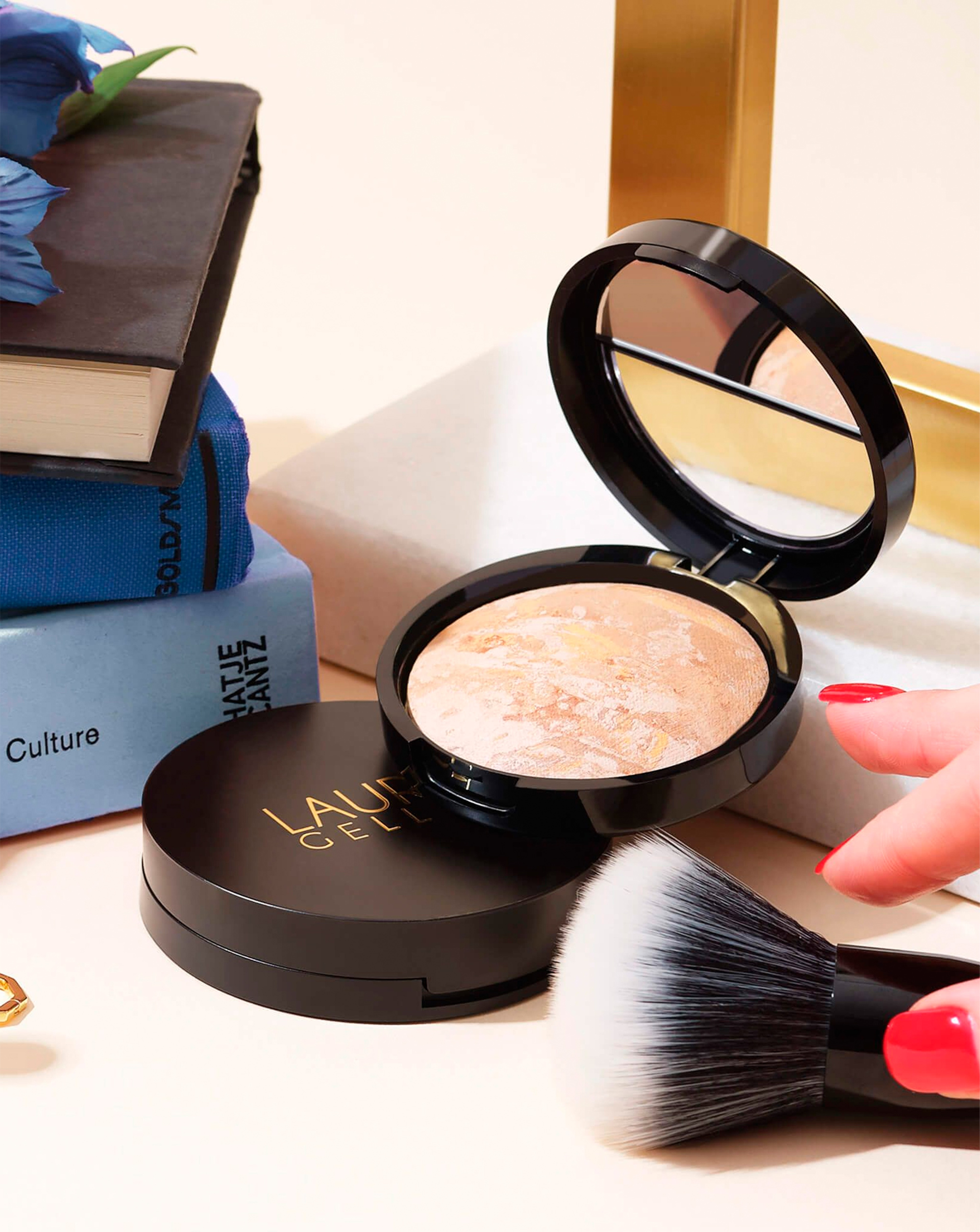Make and a brush from Laura Geller