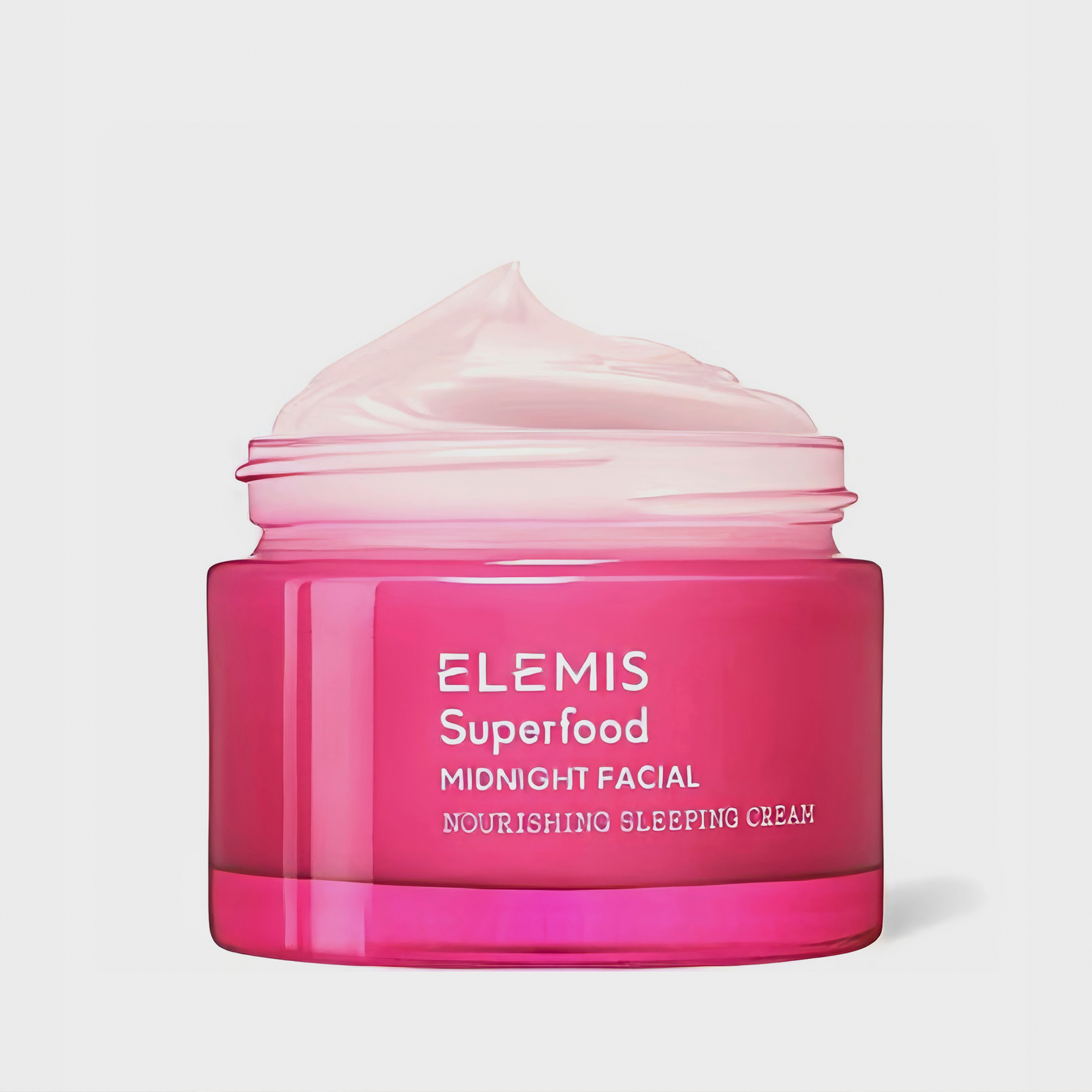 A pink jar of Elemis beauty product.