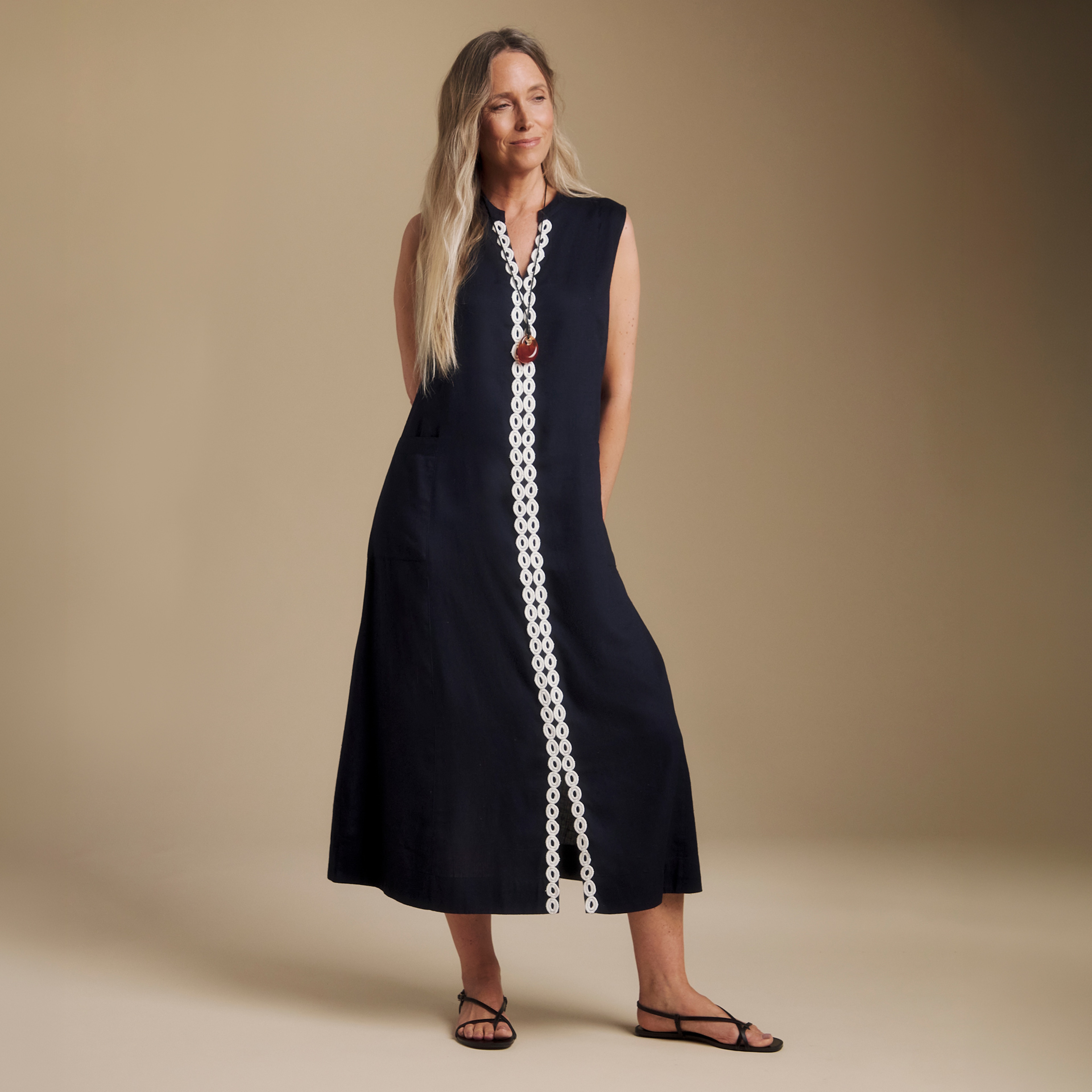Woman wearing a Julipa linen pocket midi dress