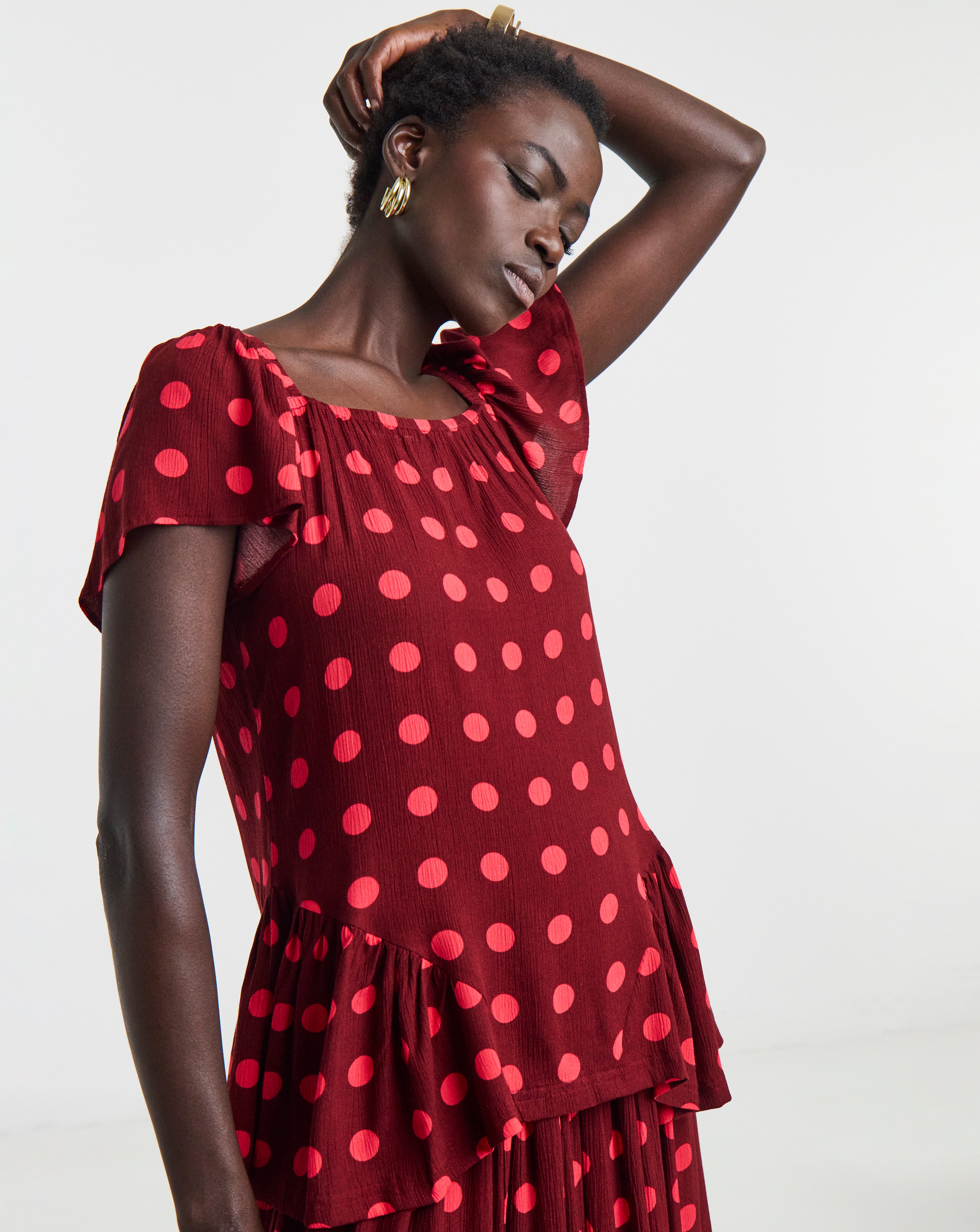 Spot Crinkle Peplum Top | JD Williams