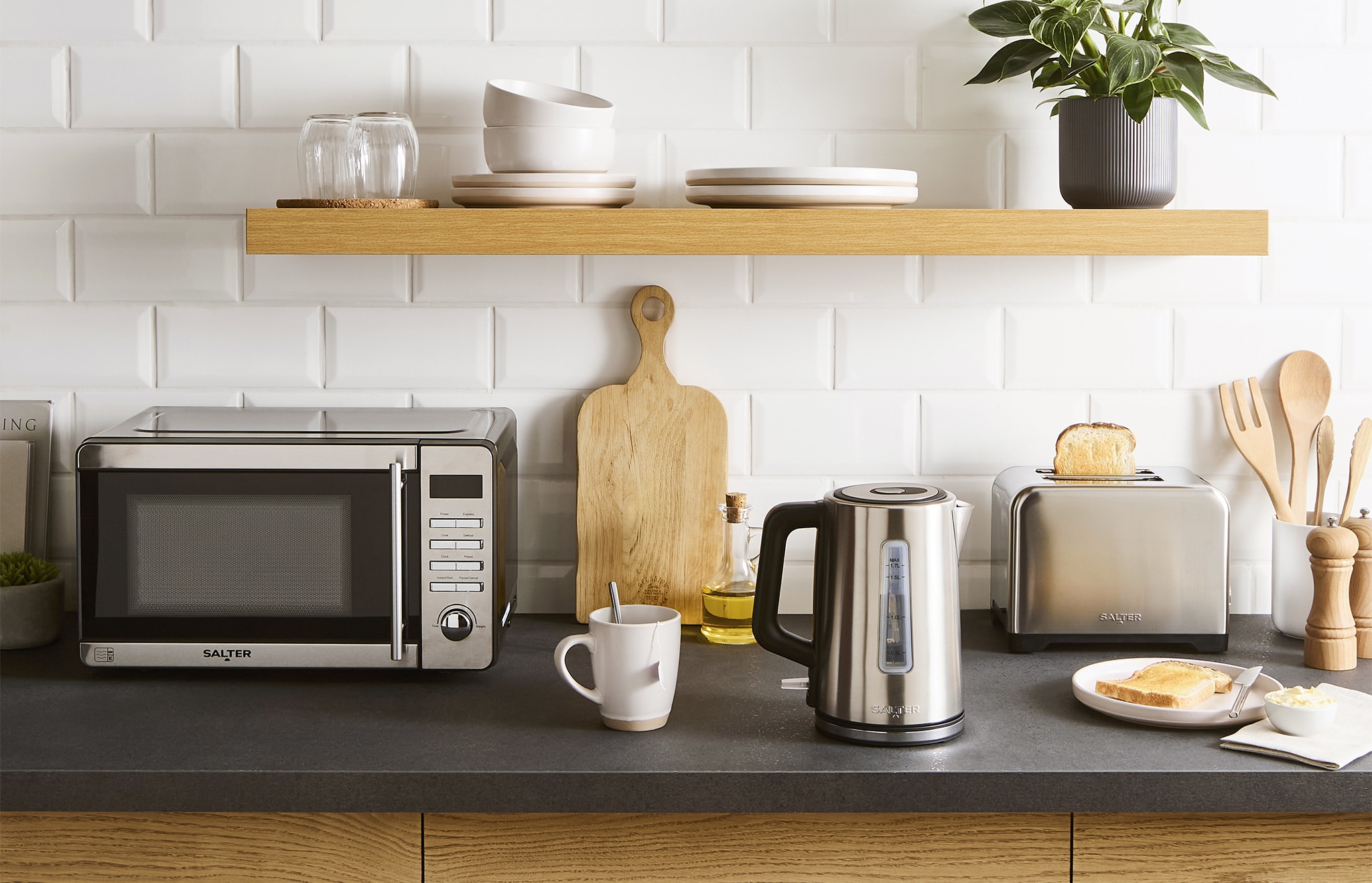 A collection of Salter kitchen appliances on a kitchen work top.