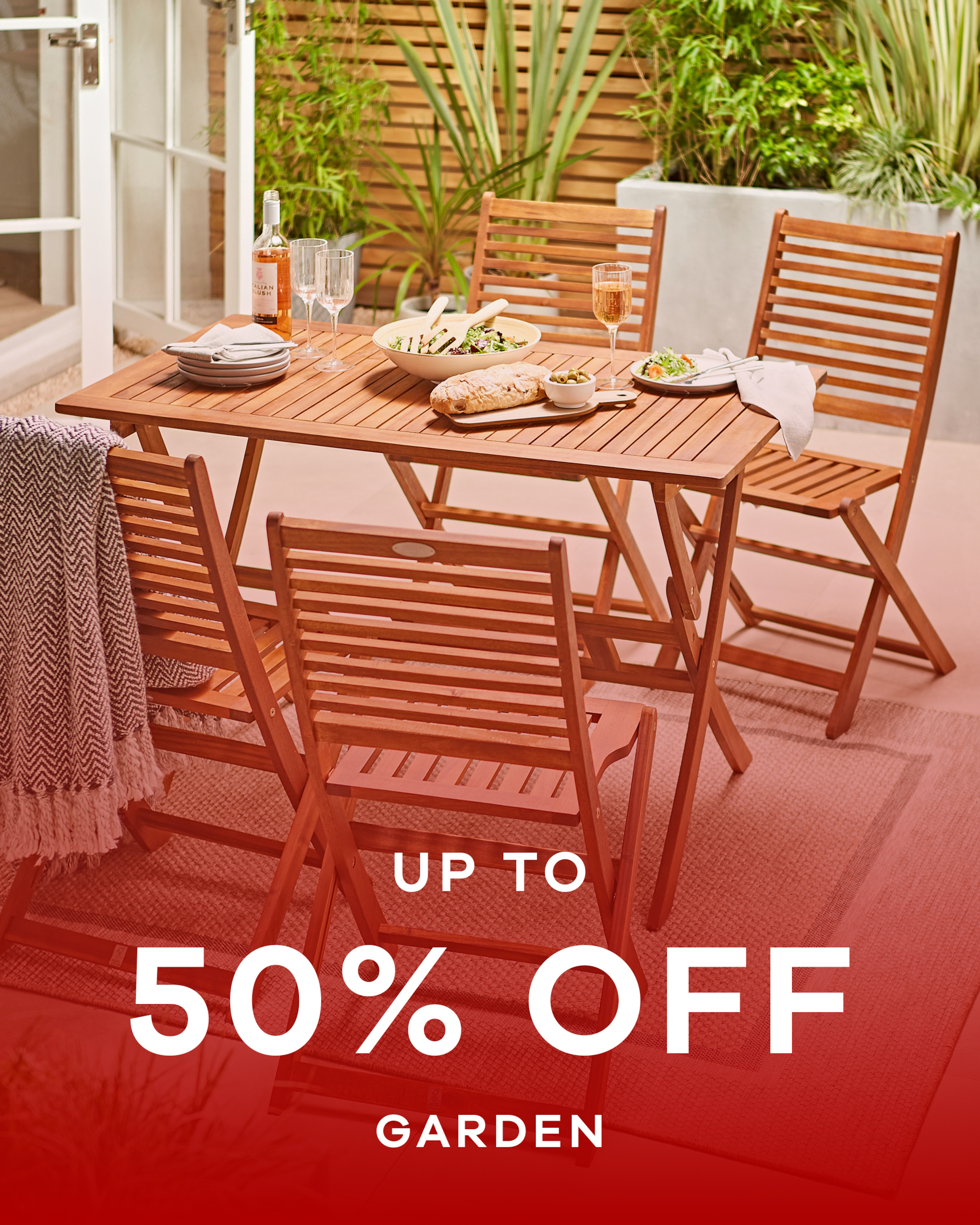 A wooden garden patio table and chair set. Up to 50% off garden.