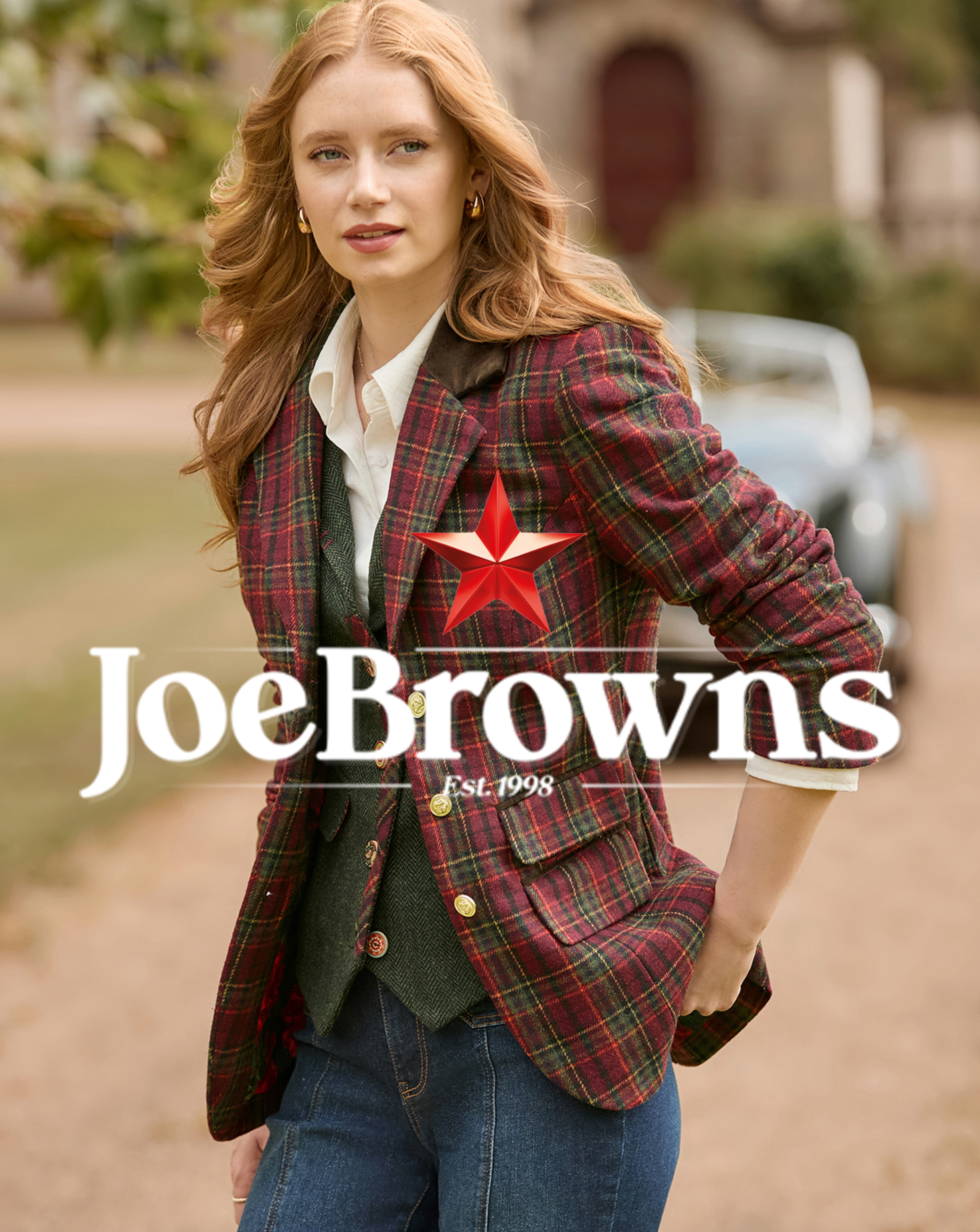 A woman wearing a Joe Browns check jacket
