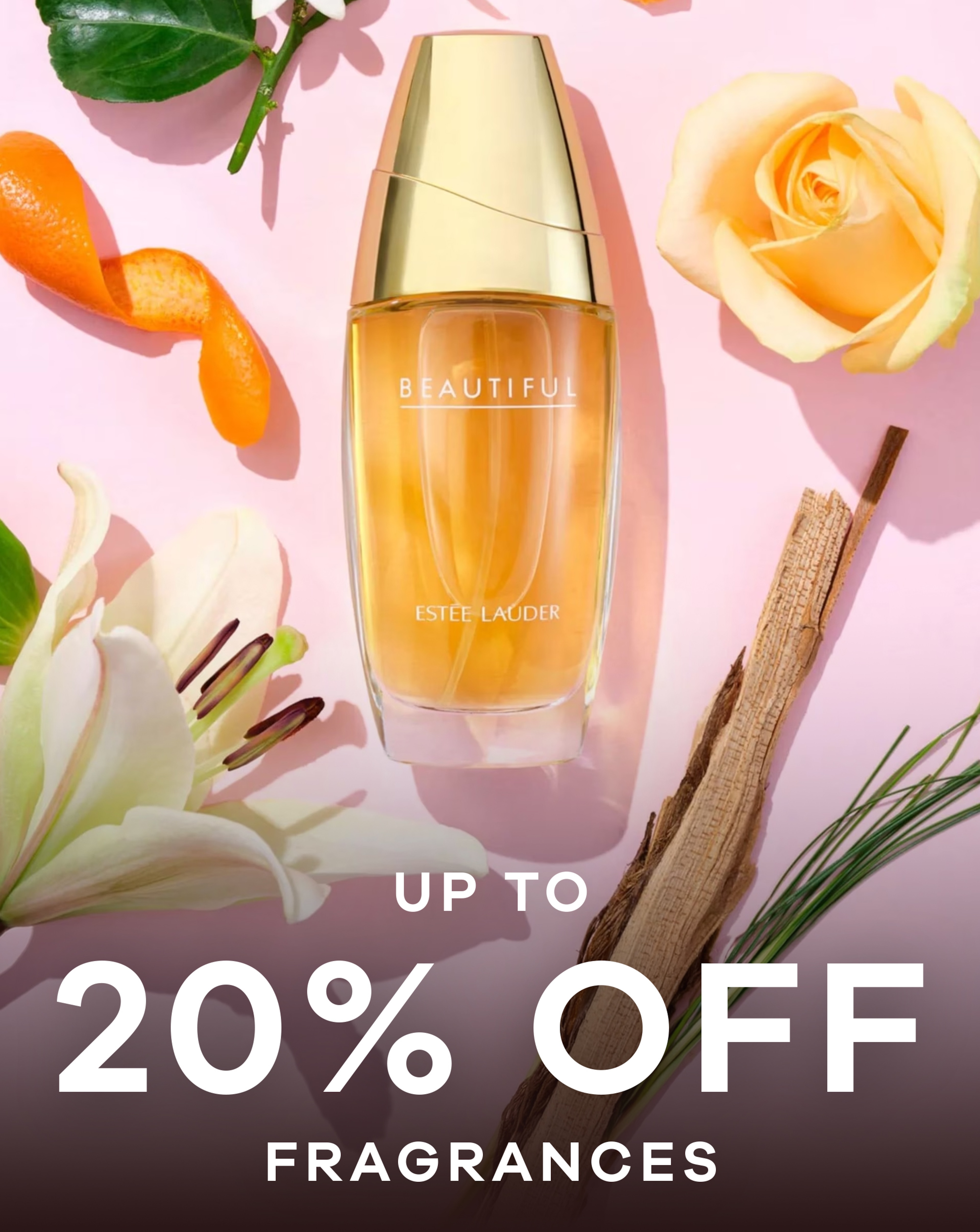 Beautiful by Estée Lauder perfume on a pink background with flowers either side of the bottle.