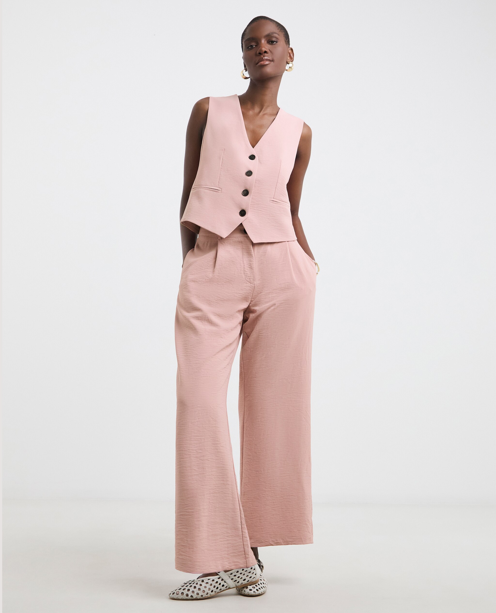 Model wears Textured Button Front Waistcoat and Trousers in Blush