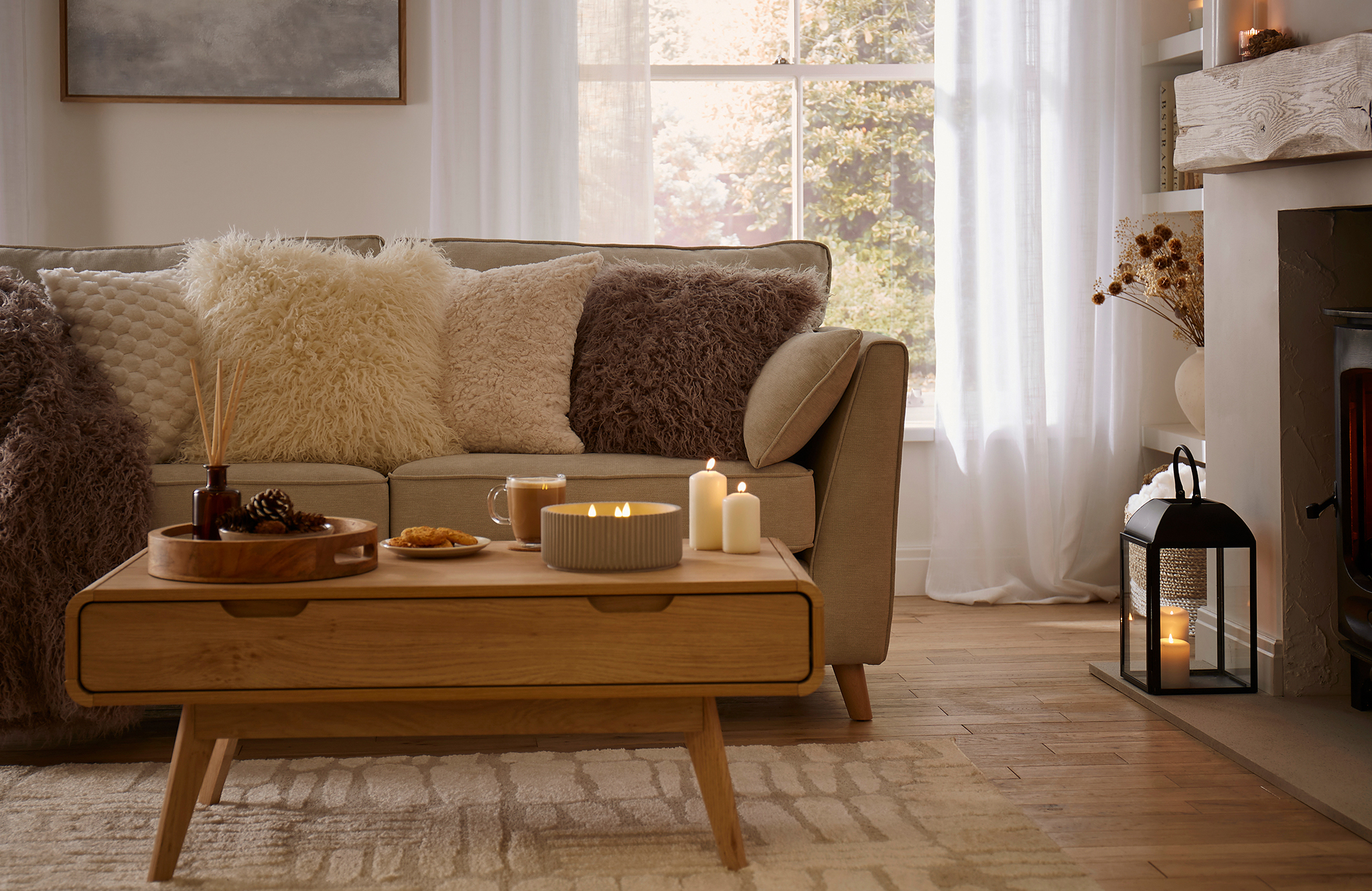 Cozy room with sofa, cushions and lamps