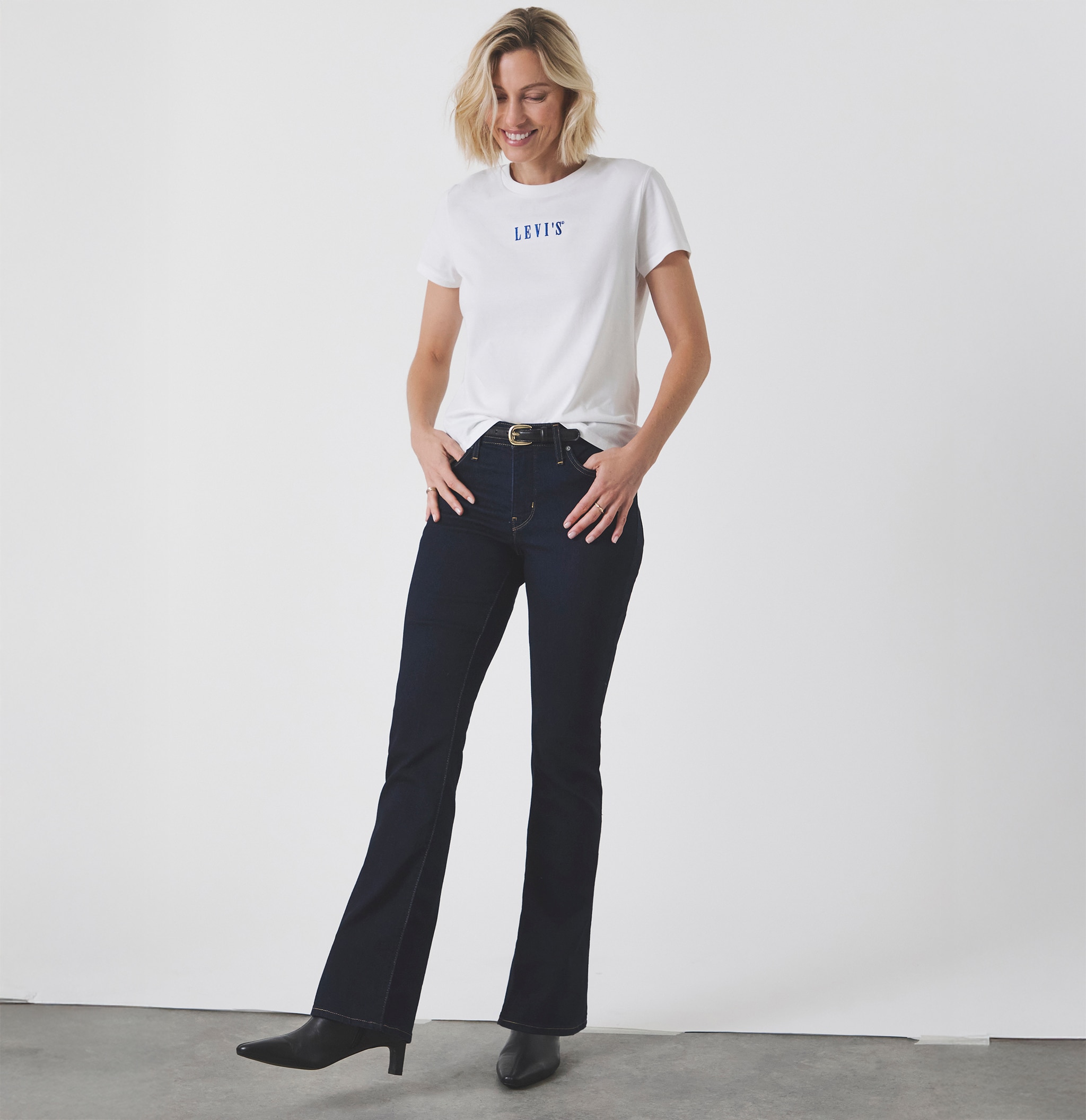 A lady wearing Levi's denim jeans