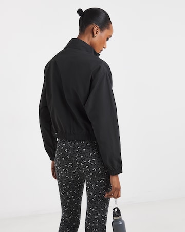 PUMA Her Relaxed Woven 1/2 Zip Crew