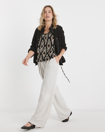 Ikat Print V Neck Short Sleeve Bubble Hem Top