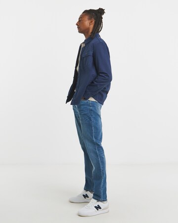 Tapered Fit Stretch Jeans Mid Wash