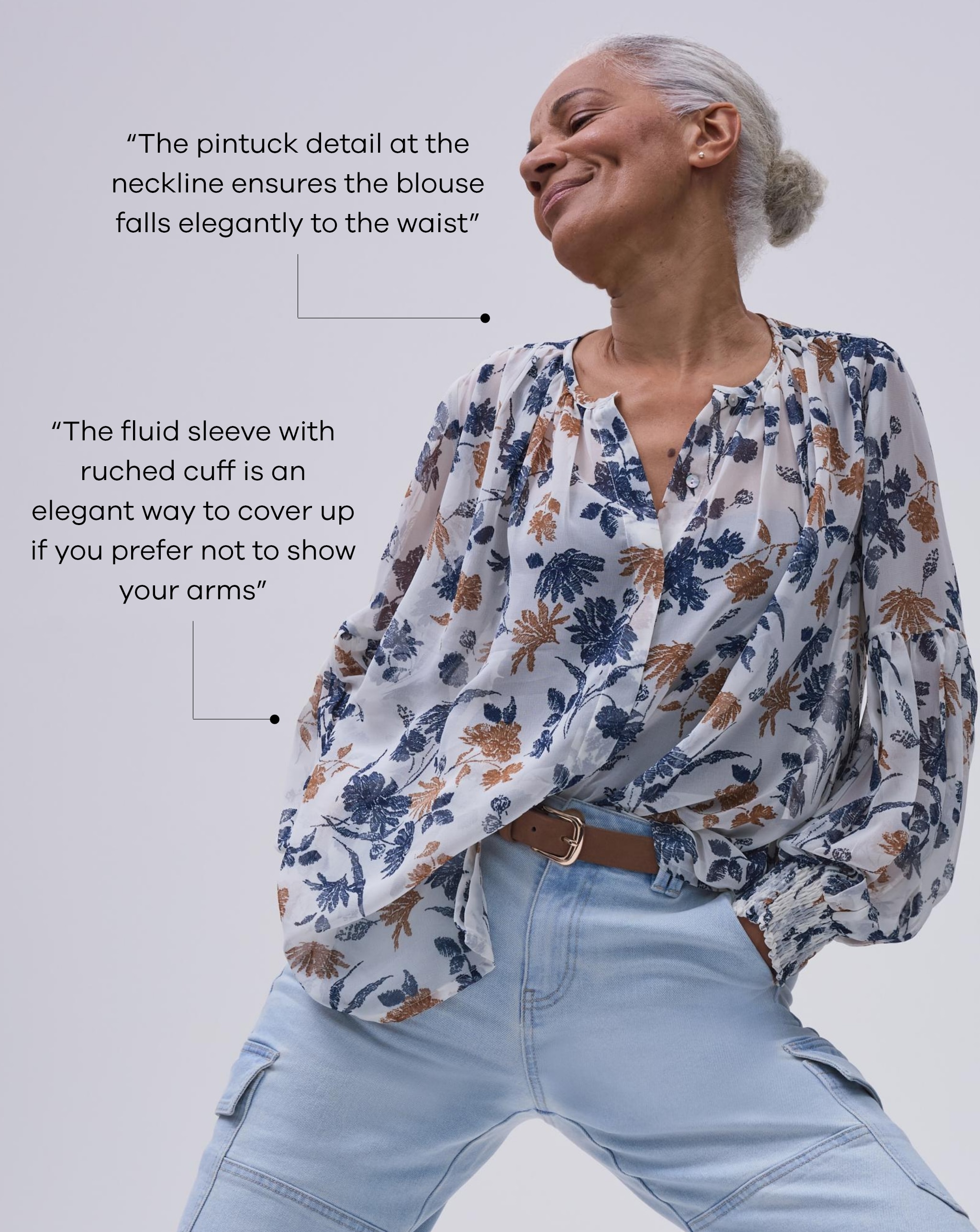 Model wearing floral blouse - Tips highlighted - The pintuck detail at the neckline ensures the blouse falls elegantly to the waist. The fluid sleeve with ruched cuff is an elegant way to cover up if you prefer not to show your arms.