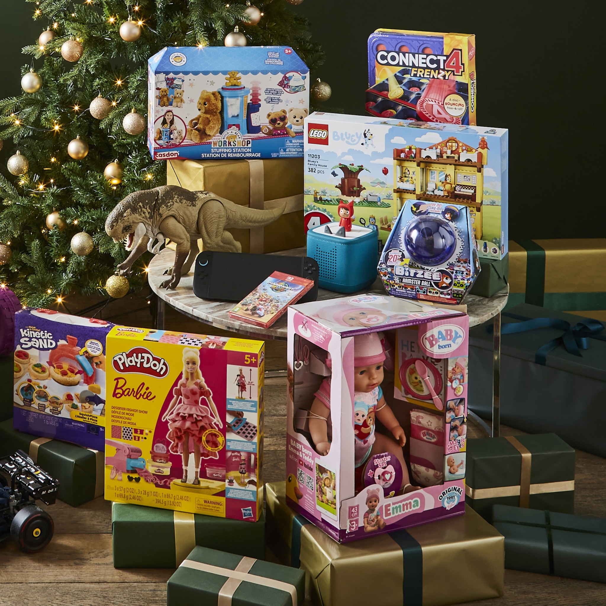 Bright Holiday Toy Gift Stack Under Christmas Tree With Dolls, Blocks, And Plush Accessories Display