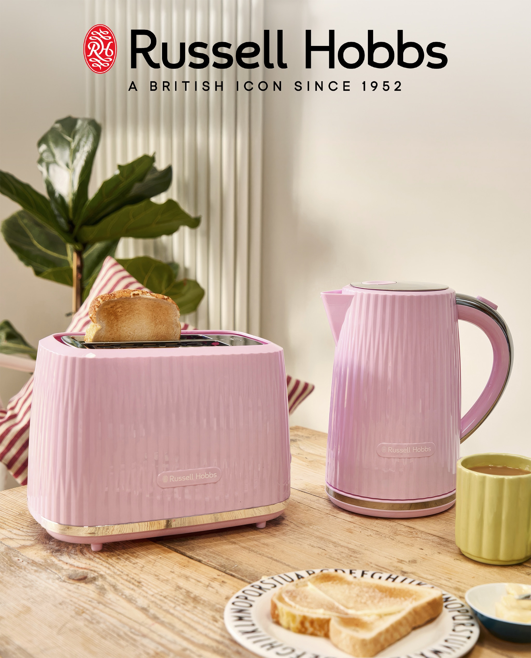 A pink Russell Hobbs toaster and kettle.