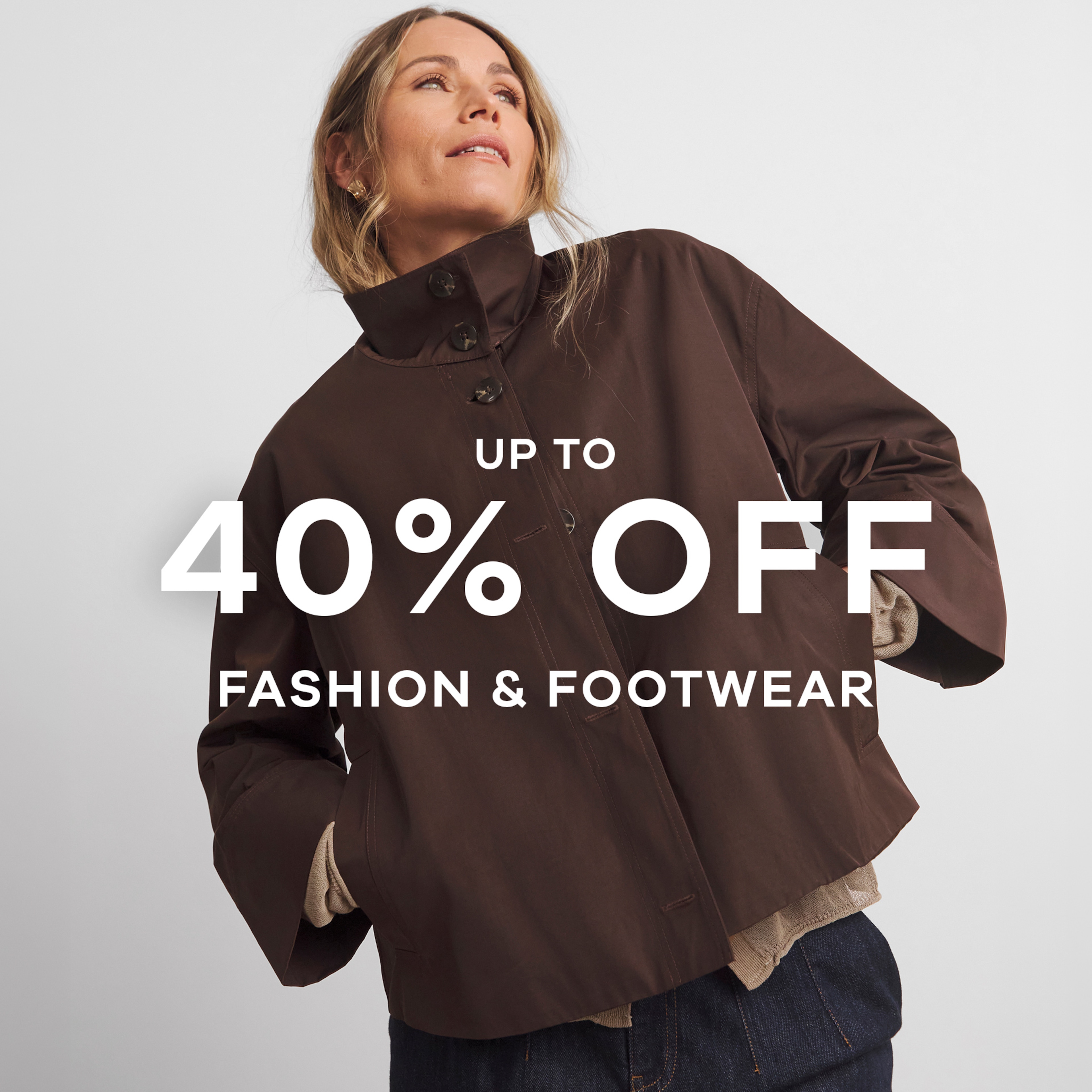 A lady stood wearing a brown jacket with the text up to 40% off fashion and footwear overlaid on the image.
