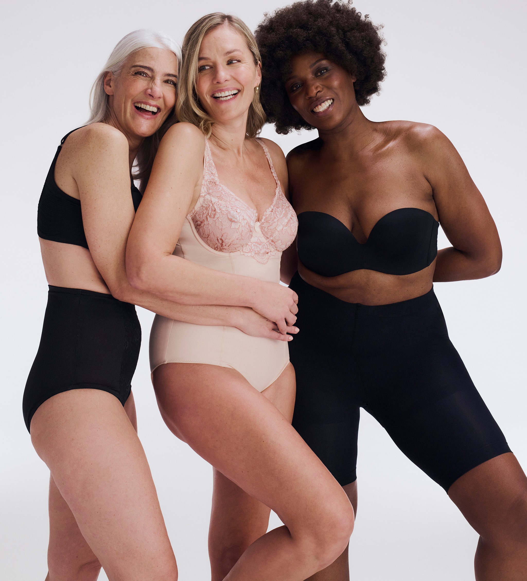 3 ladies wearing lingerie