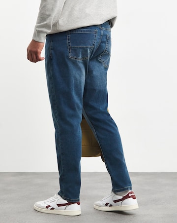 Stonewash Tapered Fit Stretch Jeans