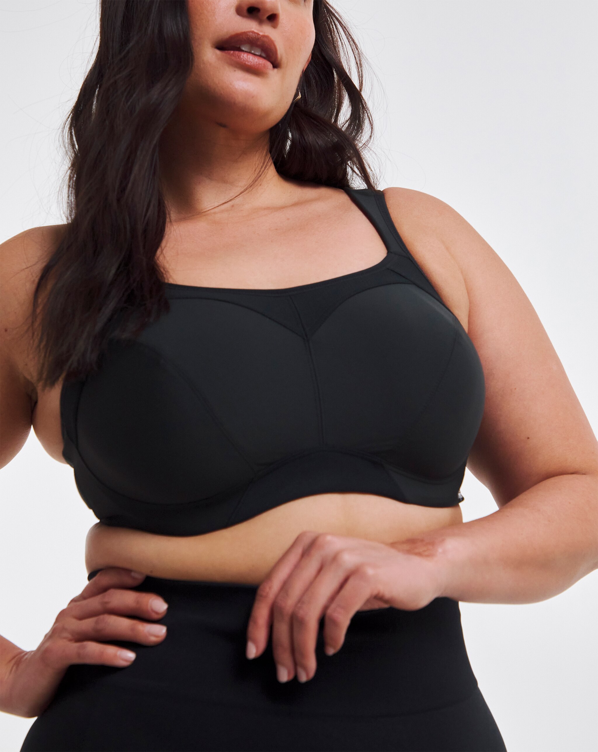 Model wearing a black Freya wired sports bra