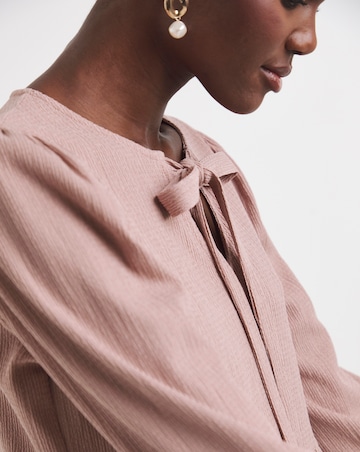 Blush Bow Blouson Peplum Top