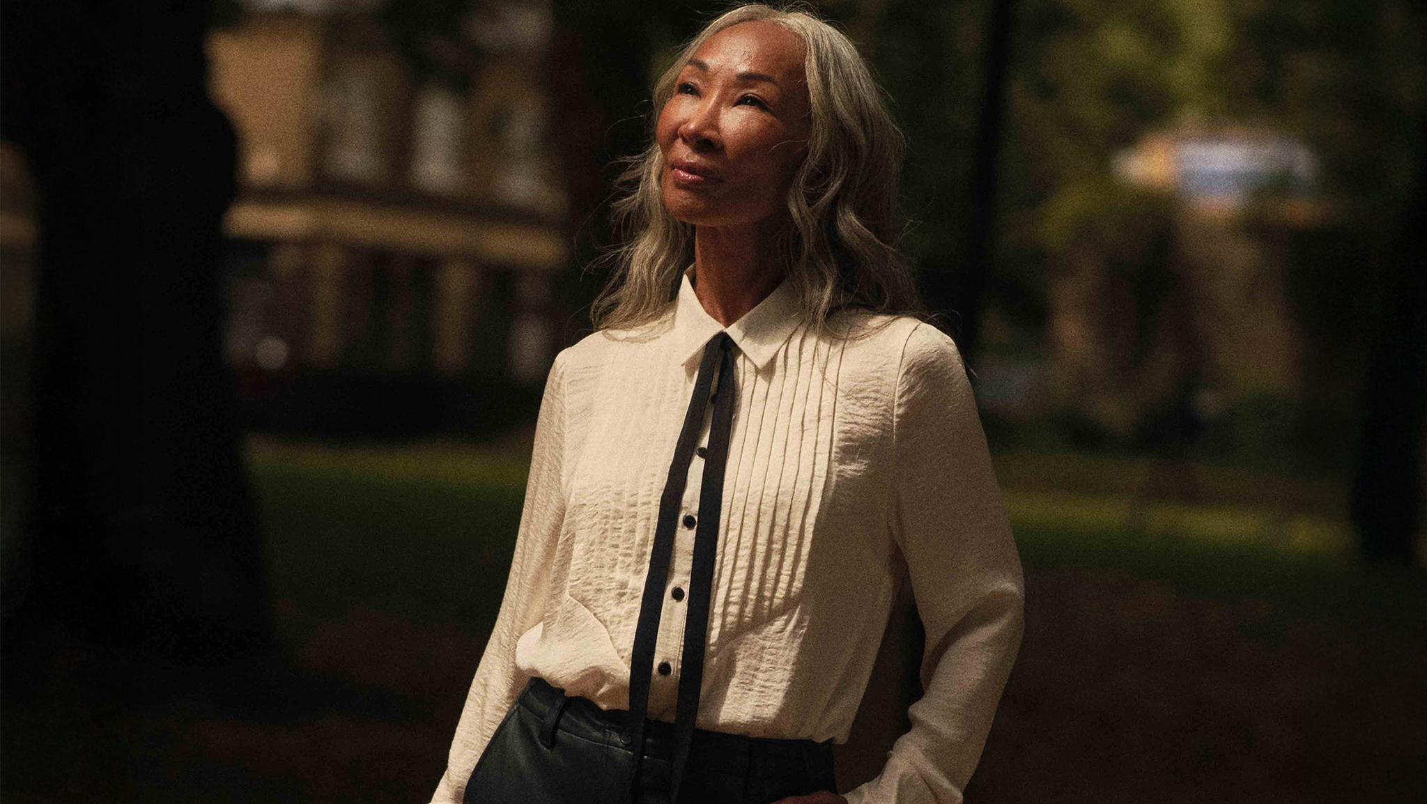 lady wearing a contrast tie hammered satin tux shirt