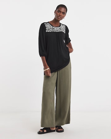 Floral Embroidered Blouson Longline Top