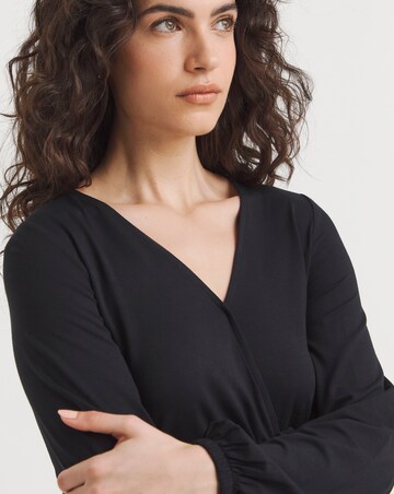 Black Wrap Bubble Hem Top