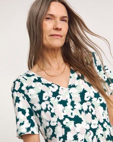 Soft Touch Asymmetric Swing Dress