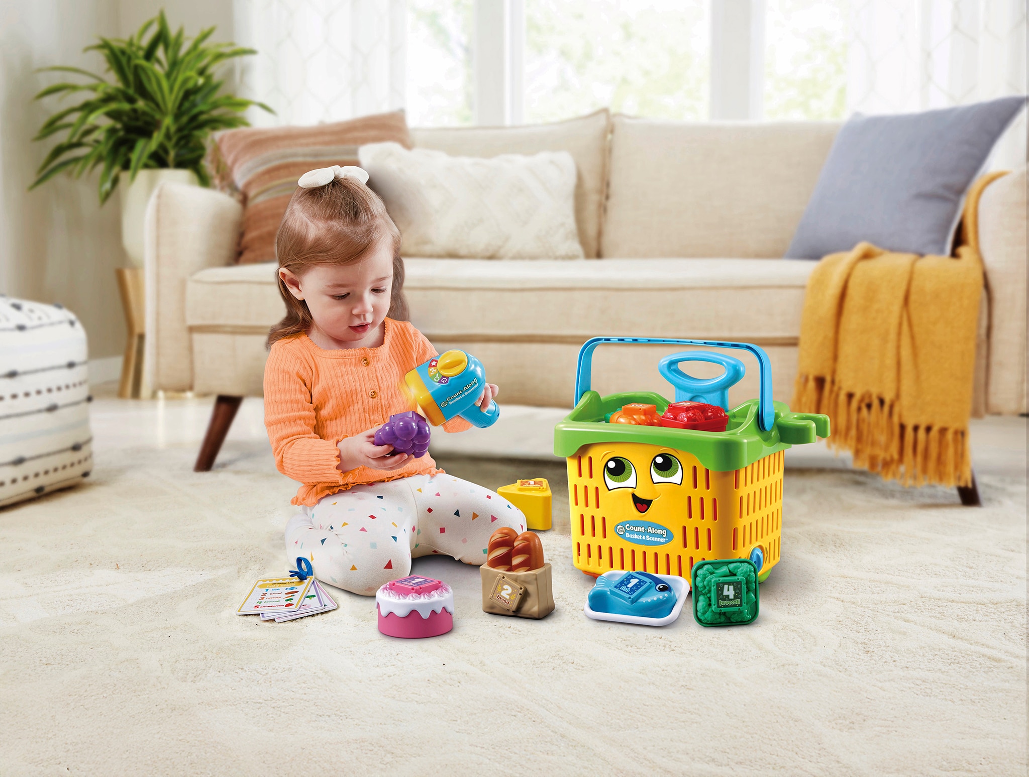 A child playing with a LeapFrog toy set