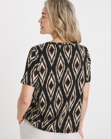 Ikat Print V Neck Short Sleeve Bubble Hem Top