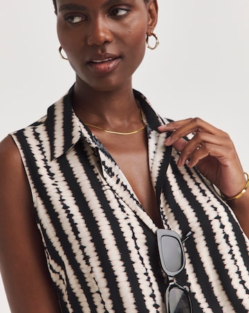 Dipped Back Sleeveless Shirt