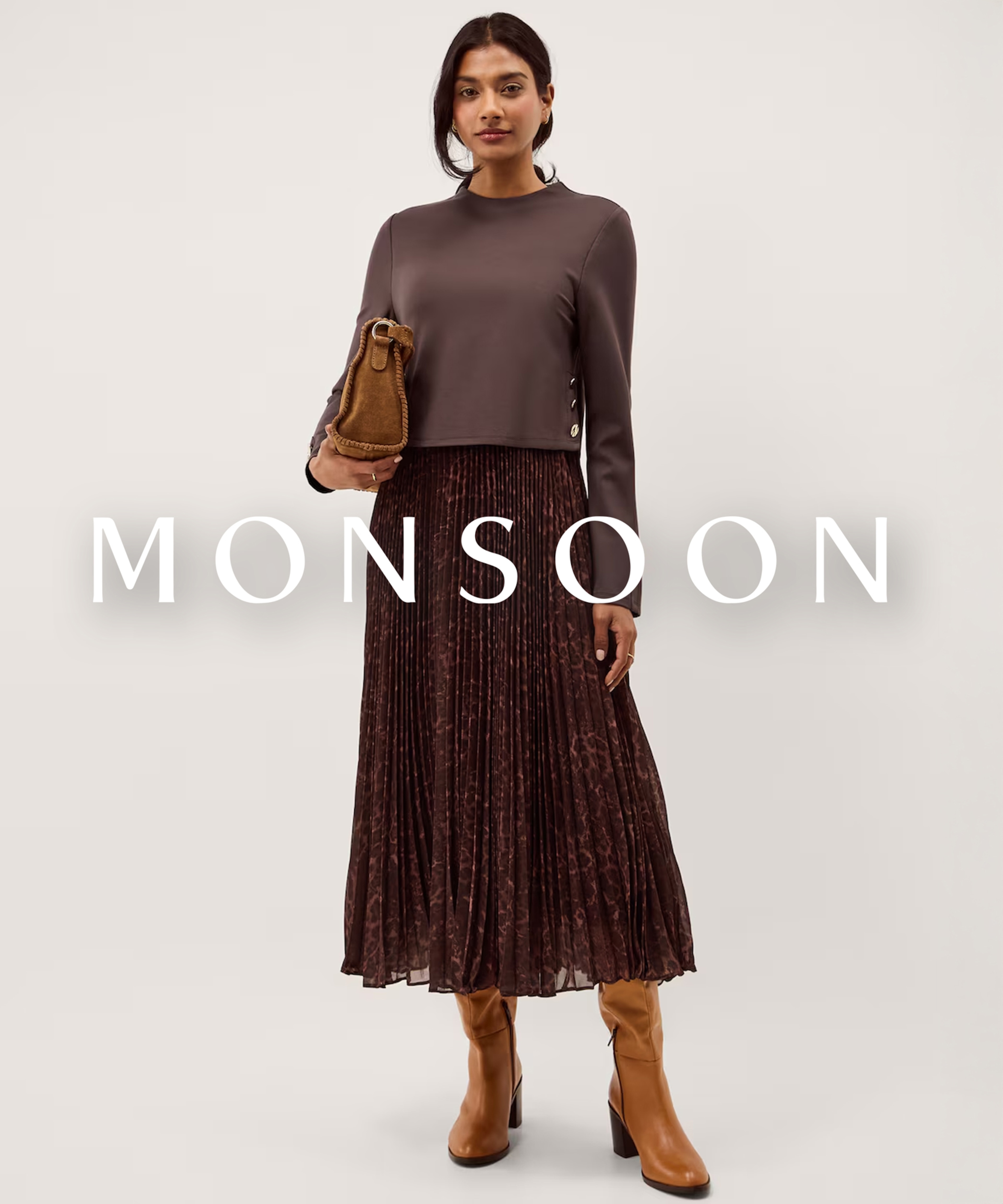 Woman wearing Monsoon top and skirt