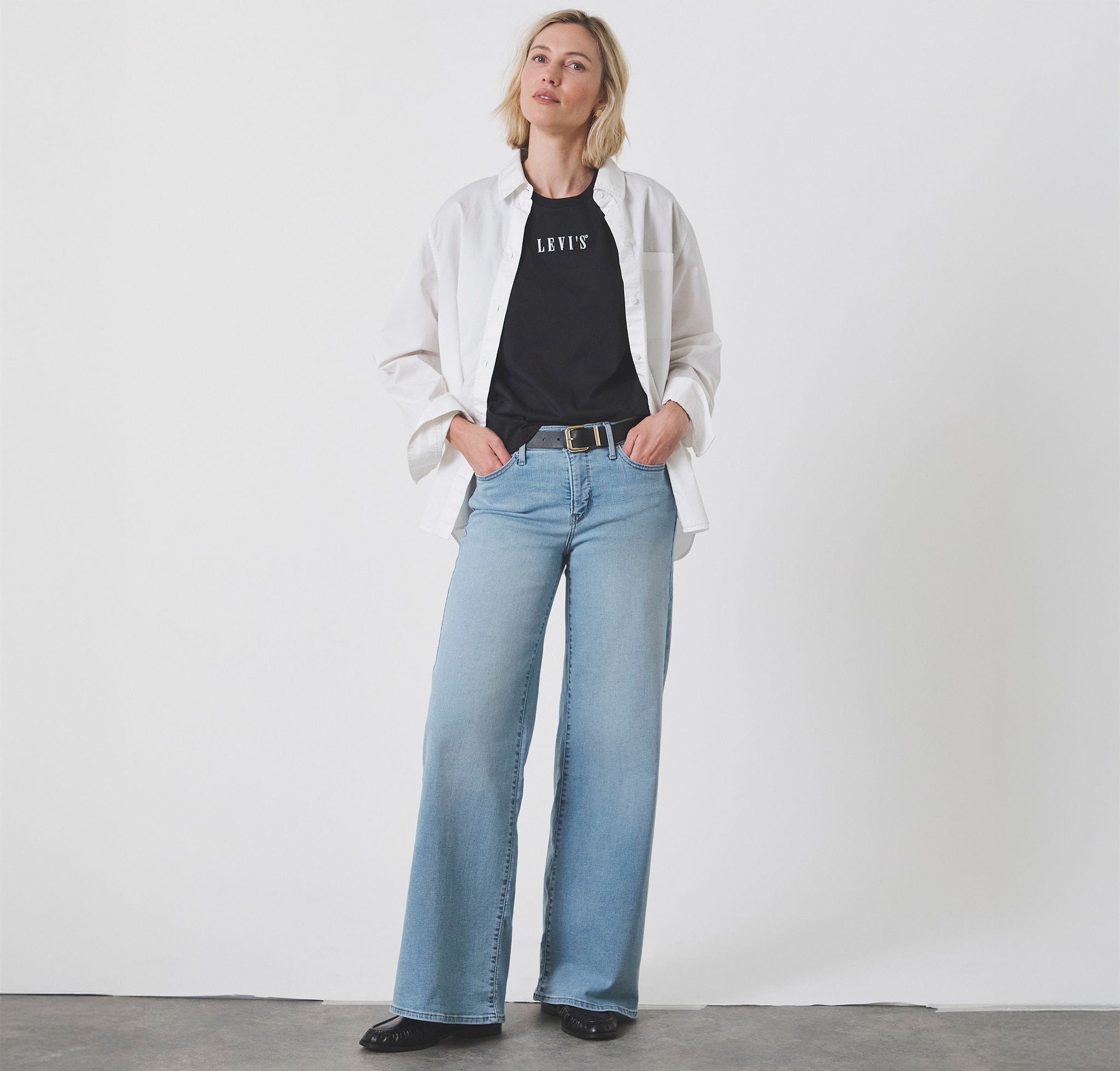 A lady wearing Levi's denim jeans